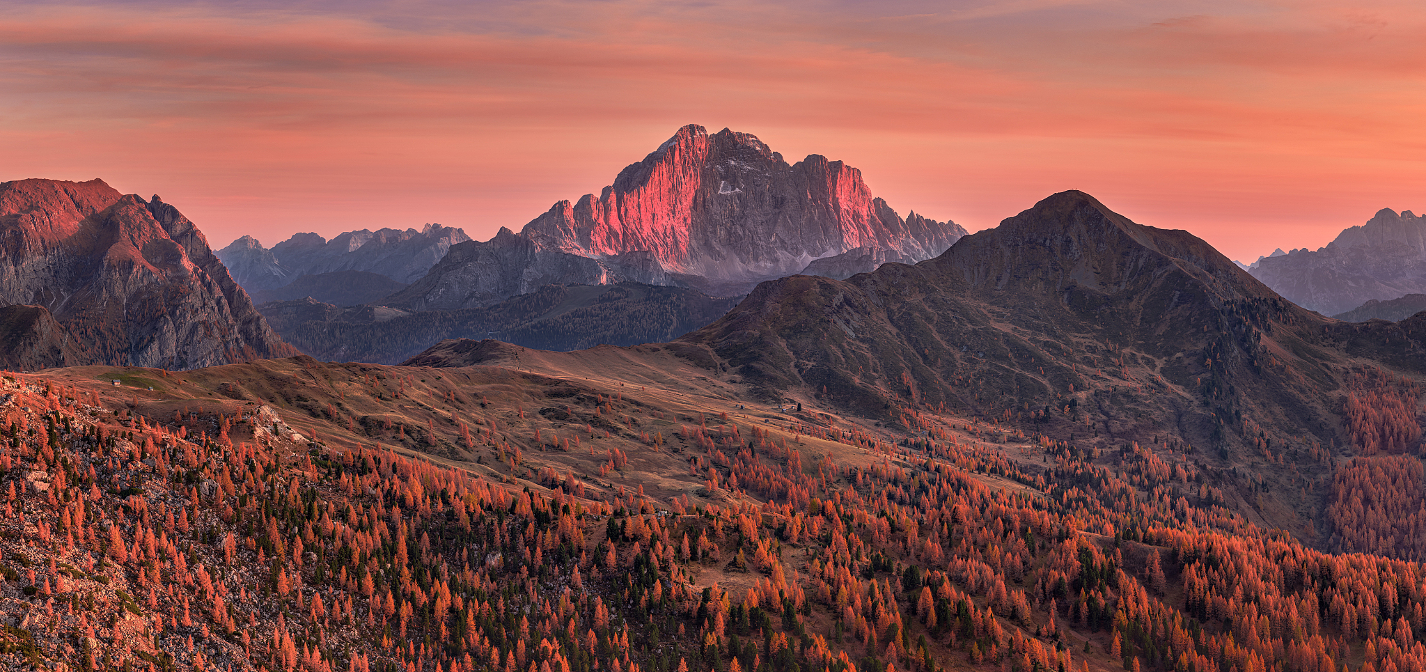 scenic view of mountains against sky during sunset