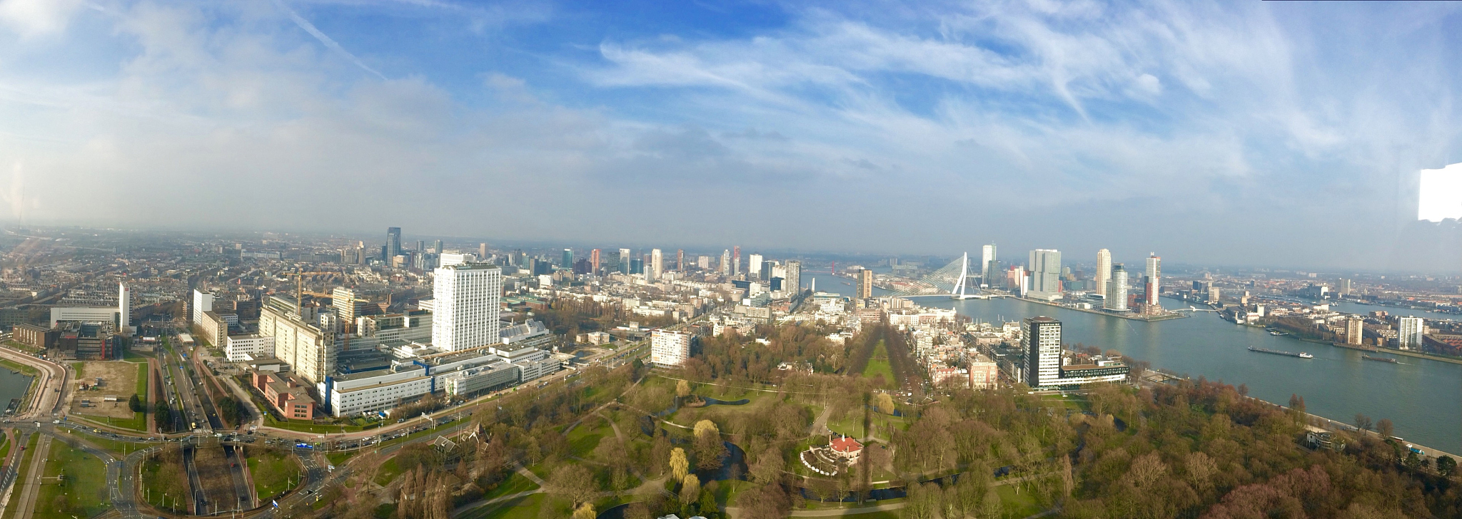 panoramic view of cityscape against blue sky