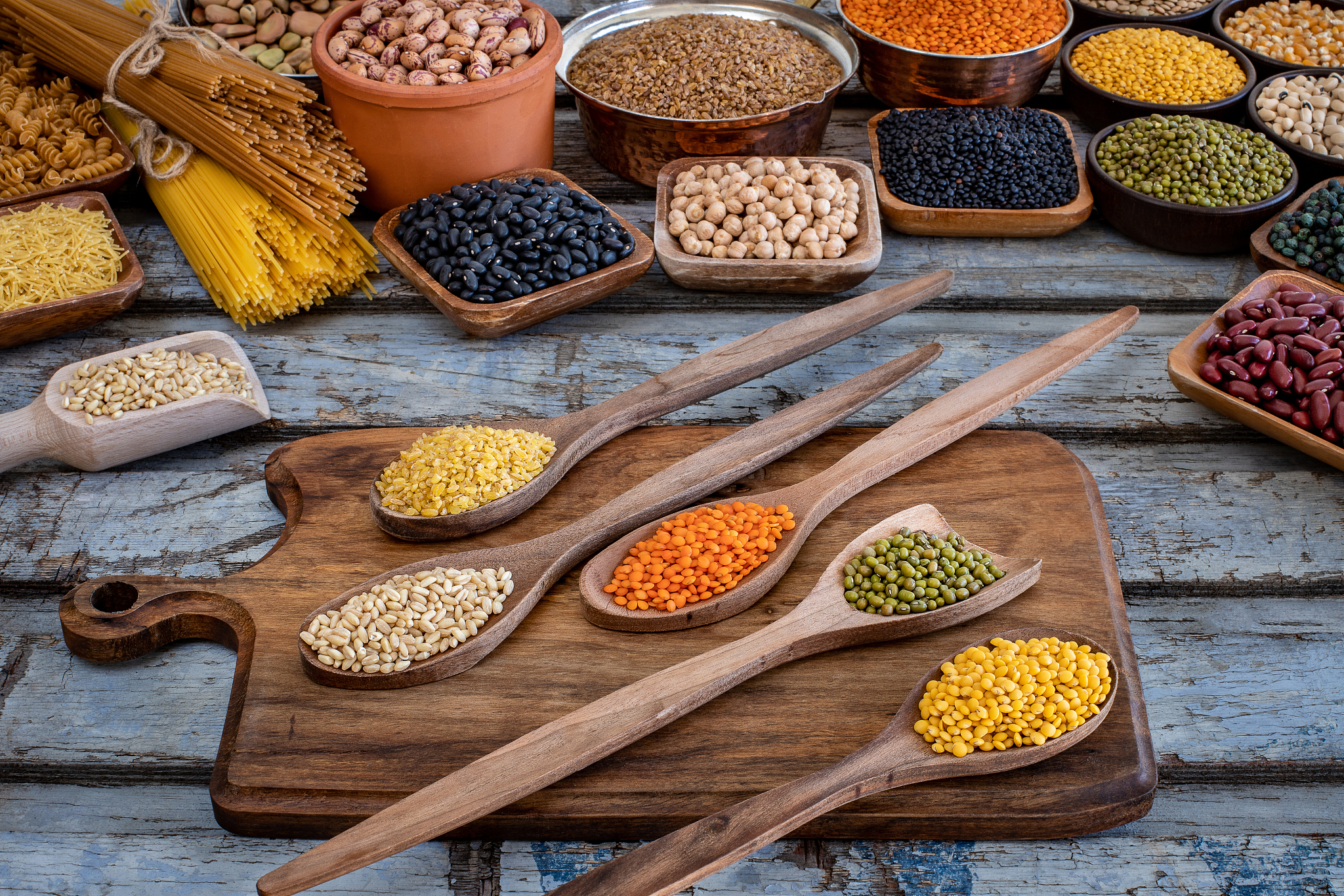 large variety of dry beans with top view.