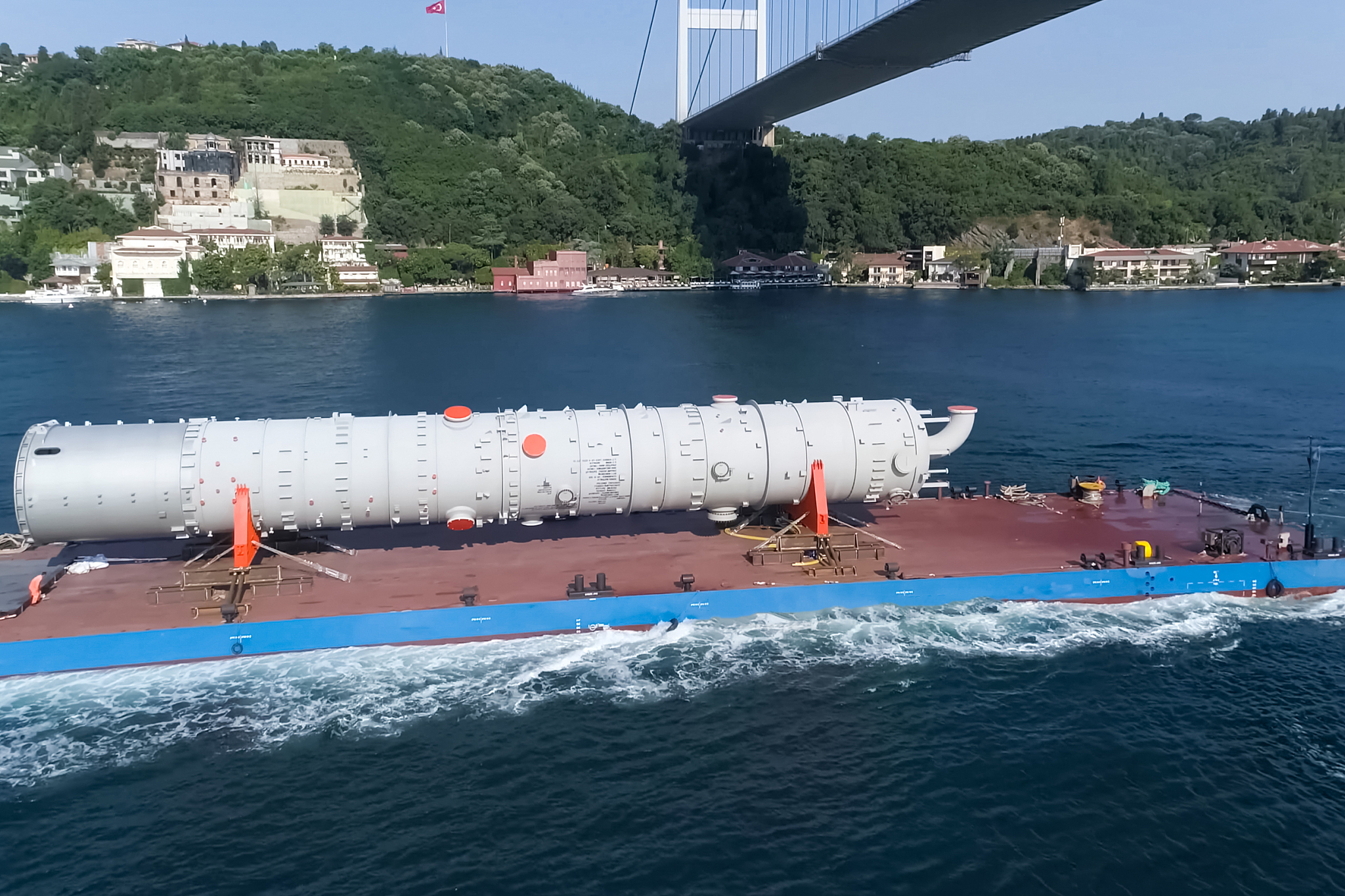 oversized cargo transportation along the river, a distillation c