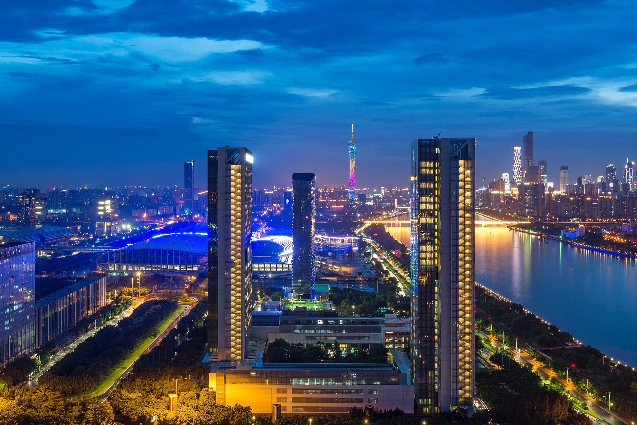 illuminated buildings in city at night