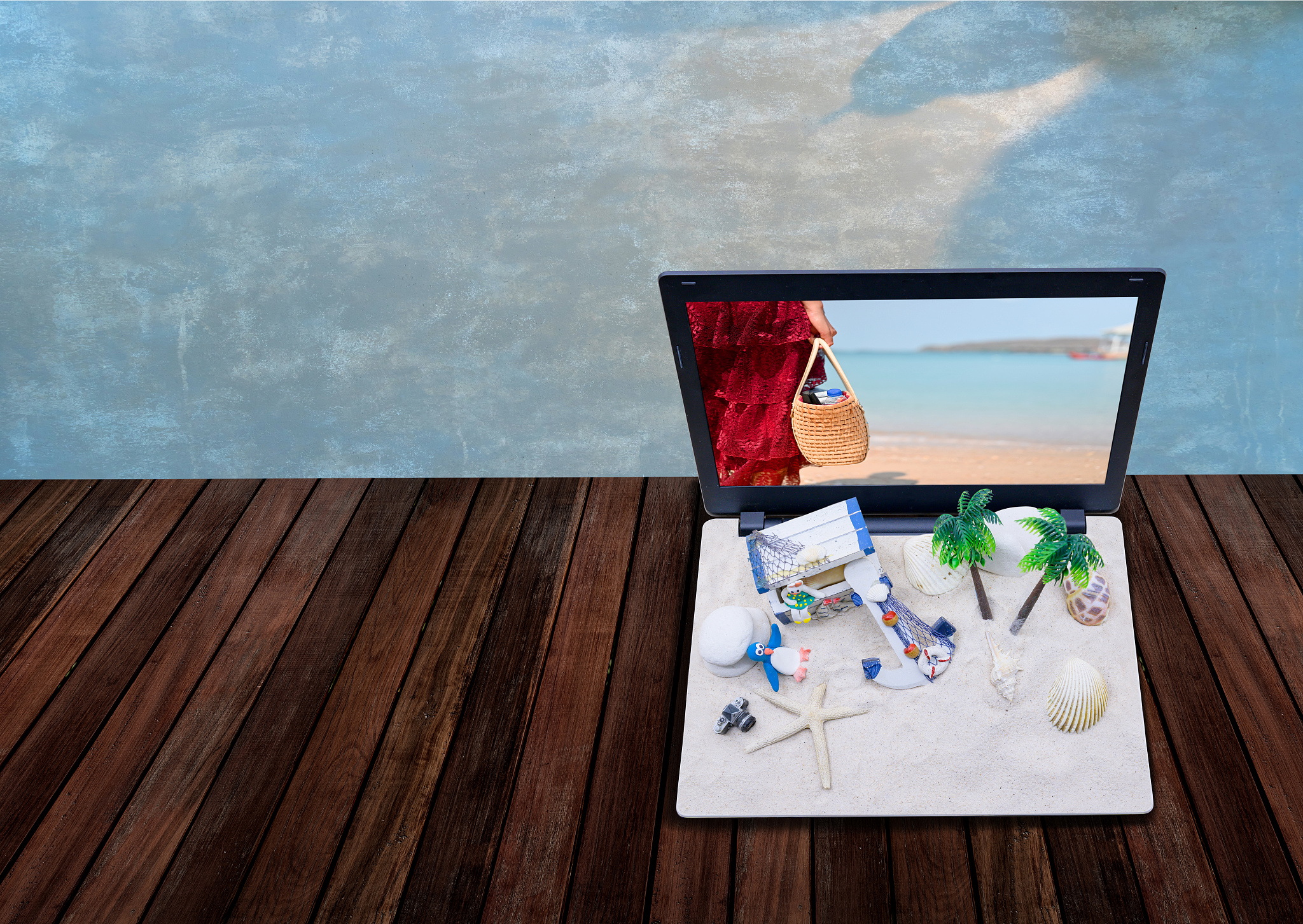 tropical sand beach with toy on summer holiday on laptop. cannot