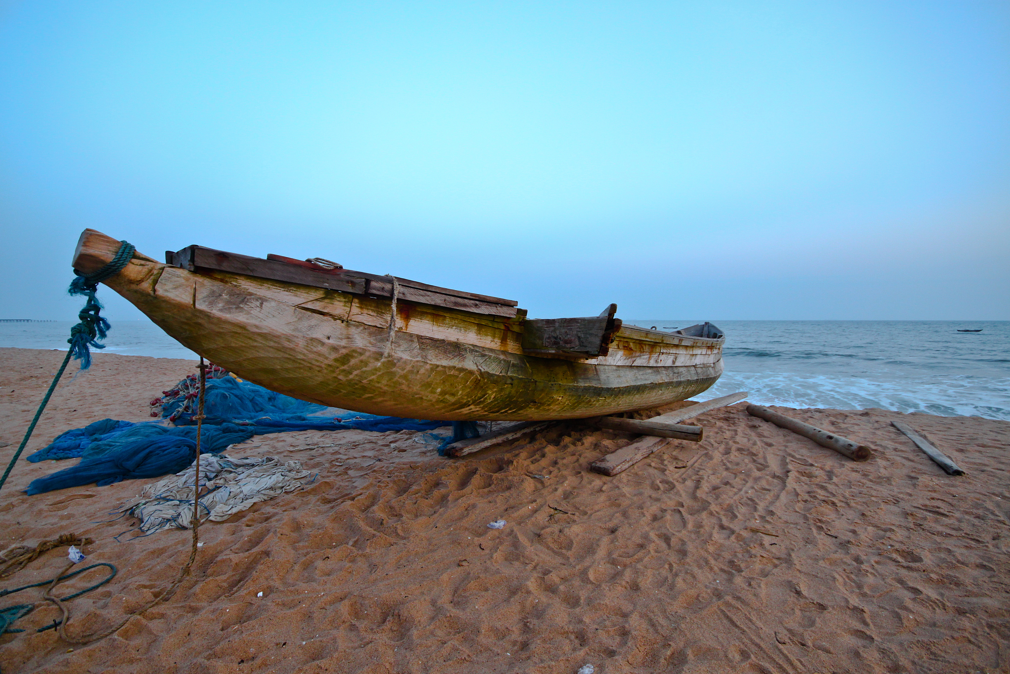 wooden boat on the shore
