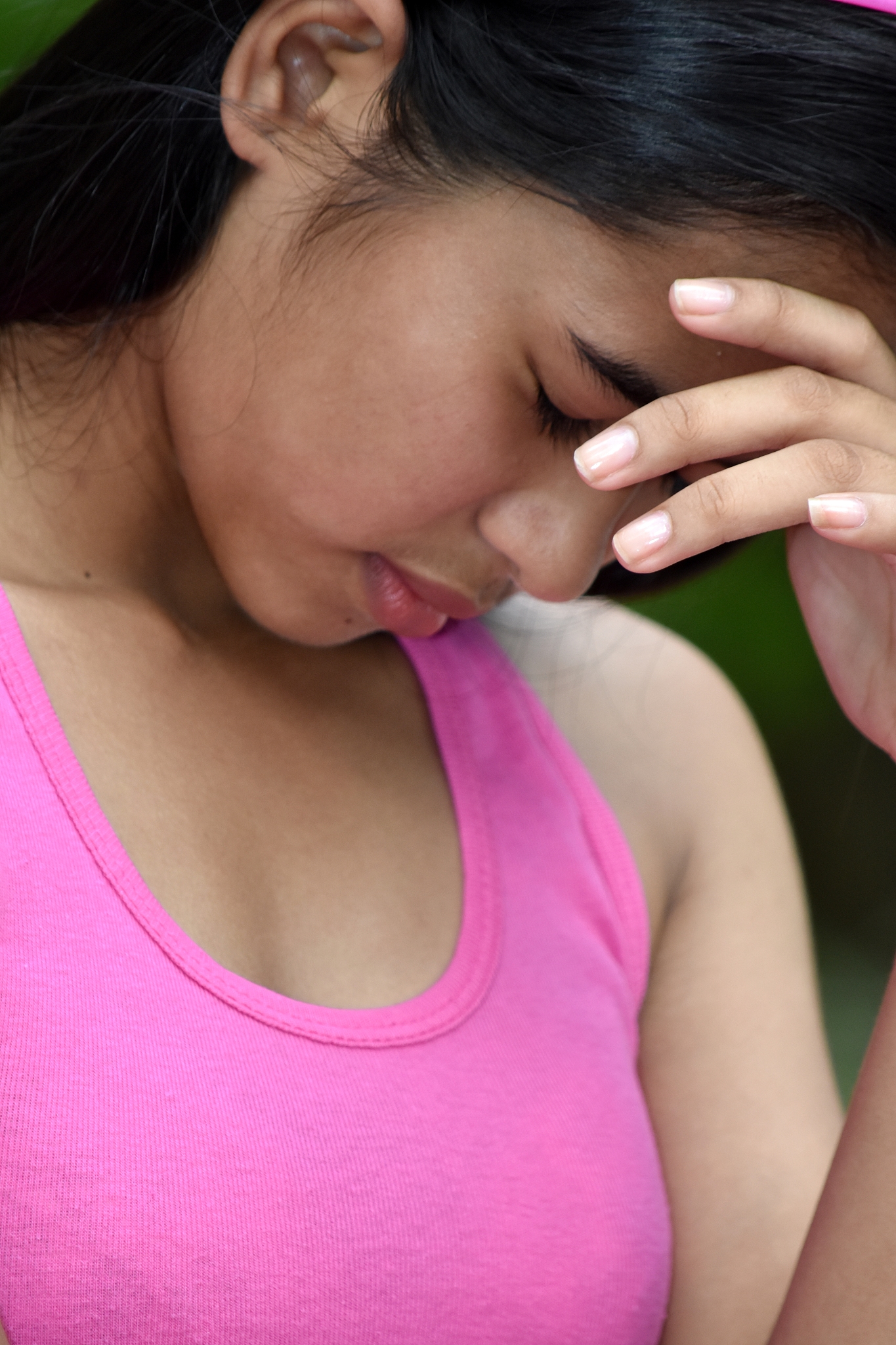 youthful asian female youngster and worry