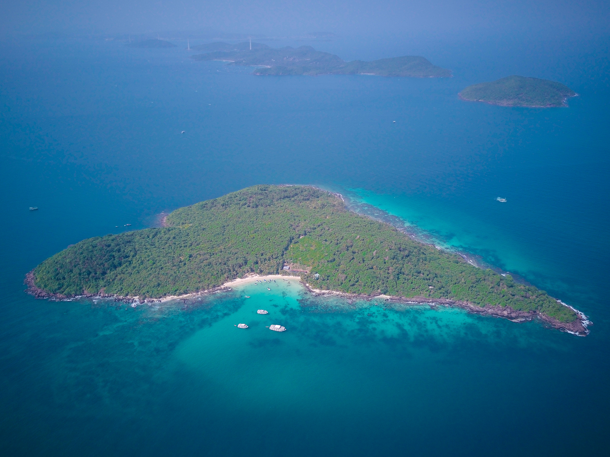 aerial view of island amidst sea