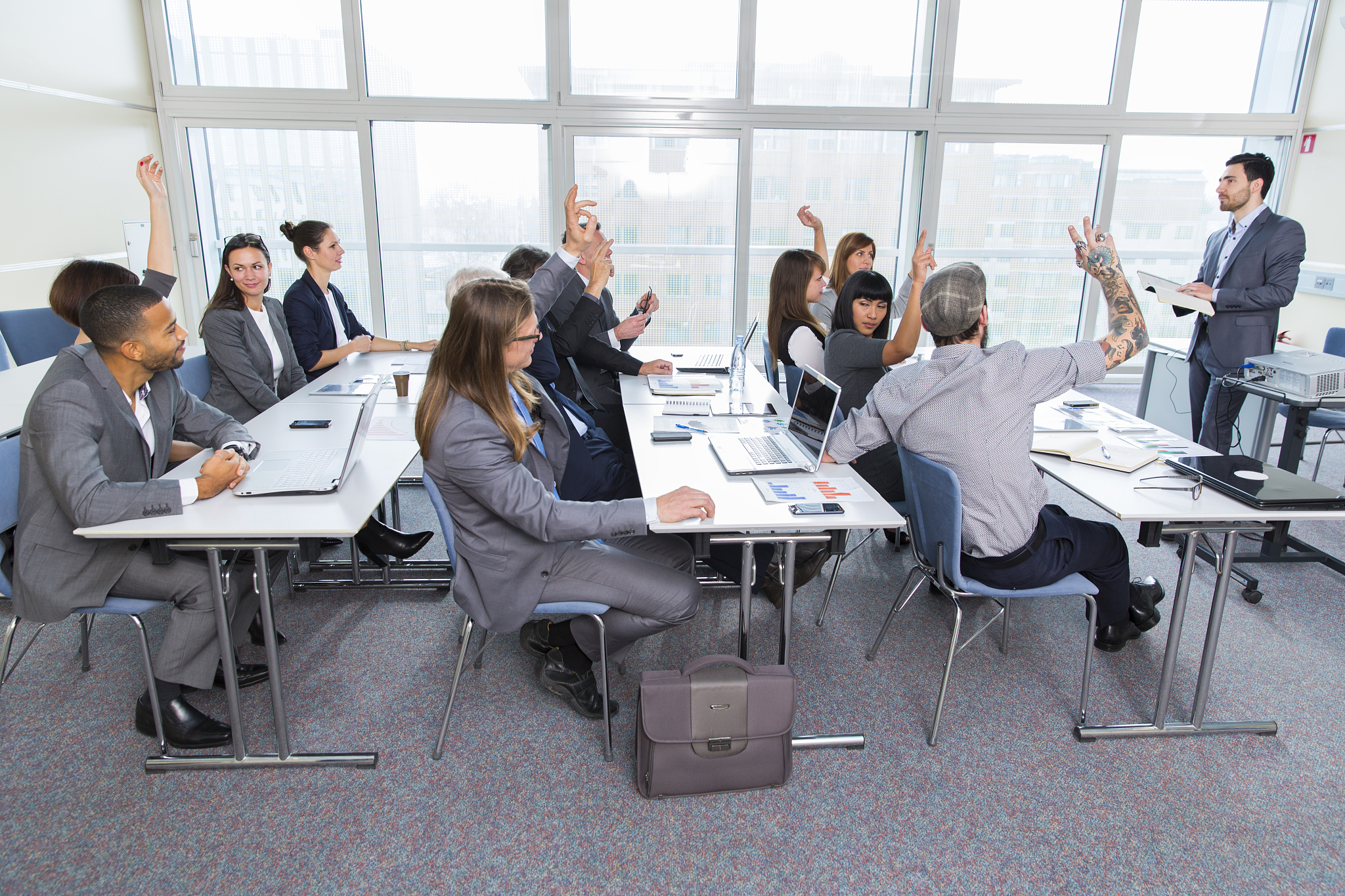 business people in a classroom listening lecturers