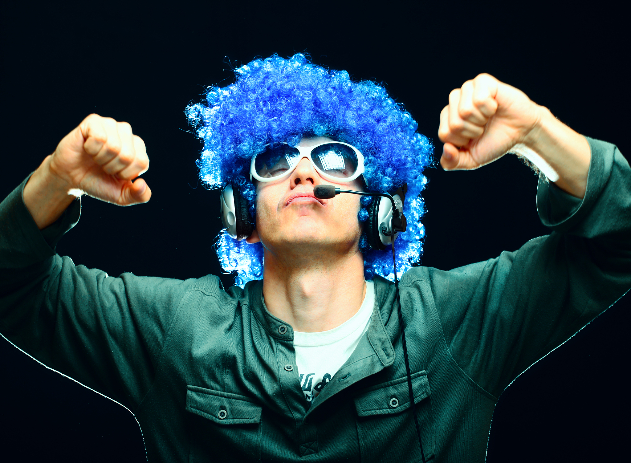 dj man dancing and listening to music