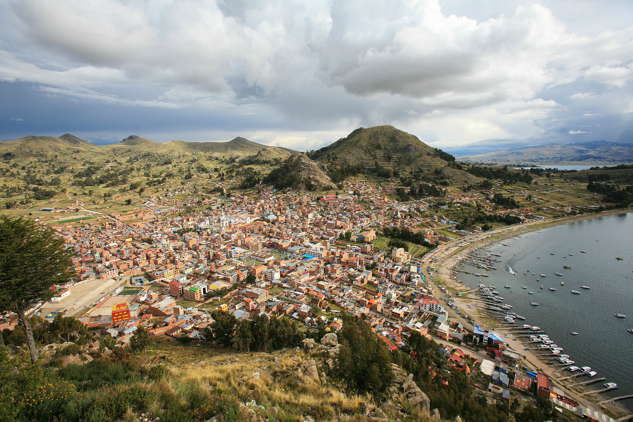 view of copacabana city, on the shore of lake titicaca, and the 