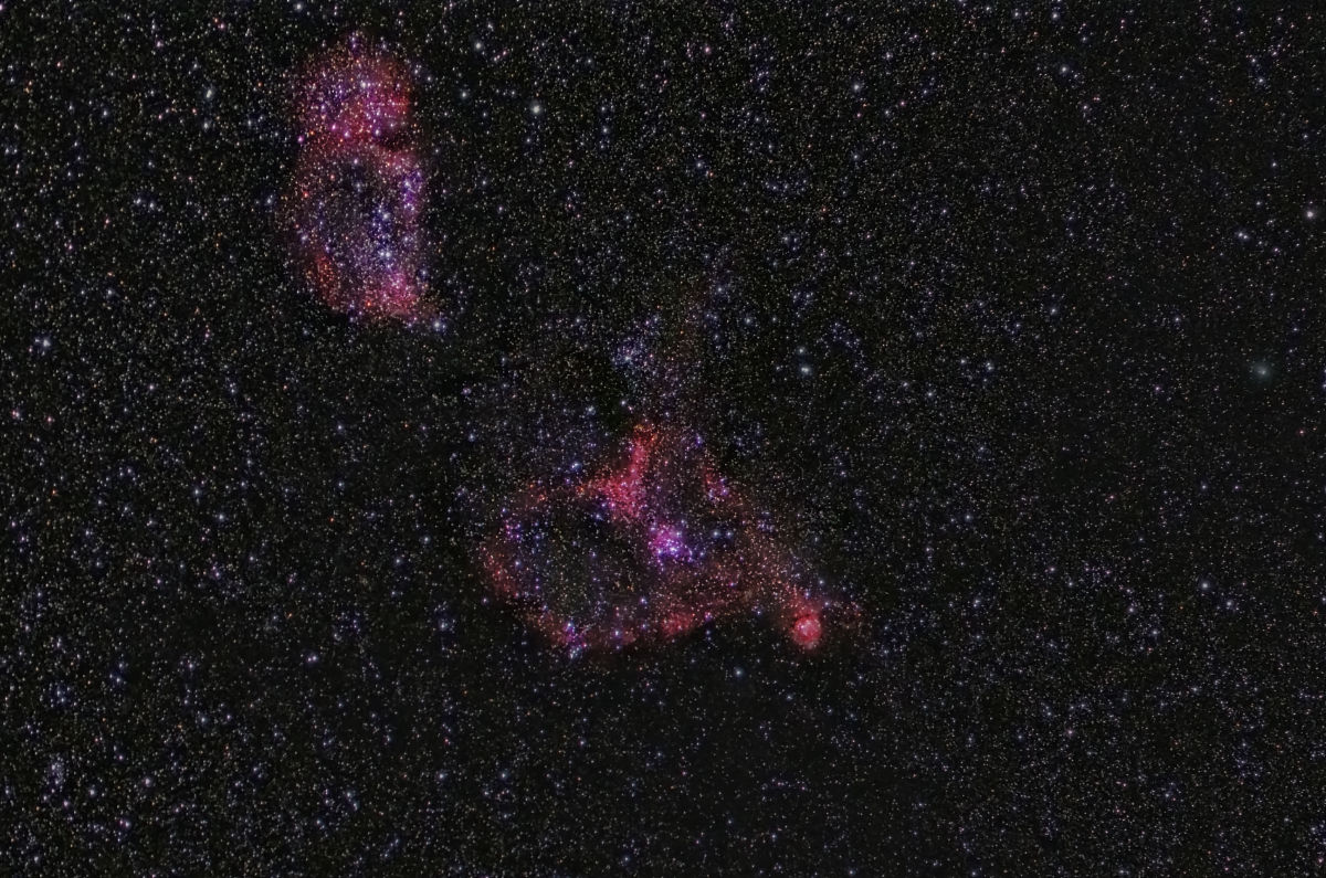 红彤彤的心和灵魂星云,点缀着星星