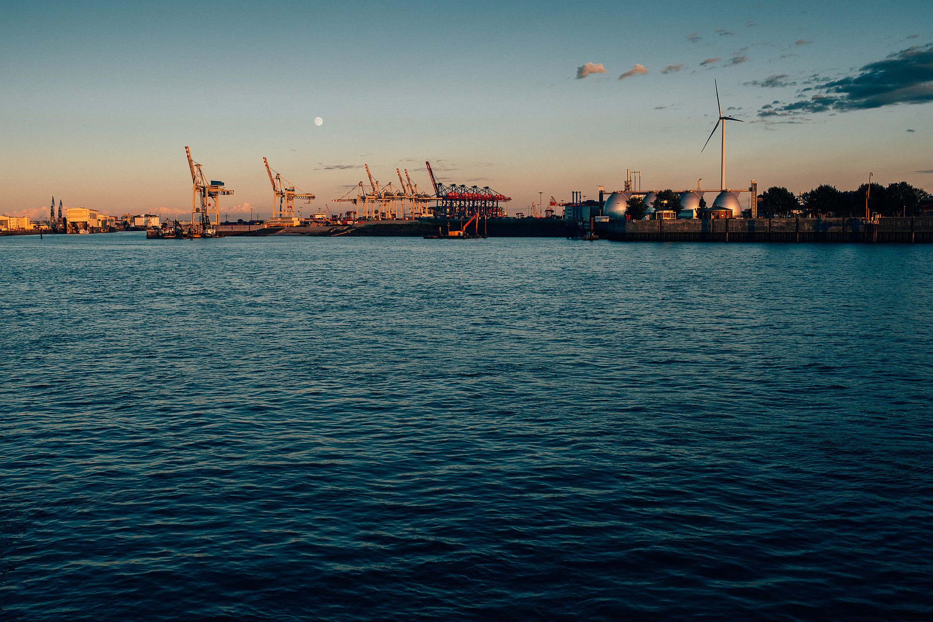 view of commercial dock against sky during sunset