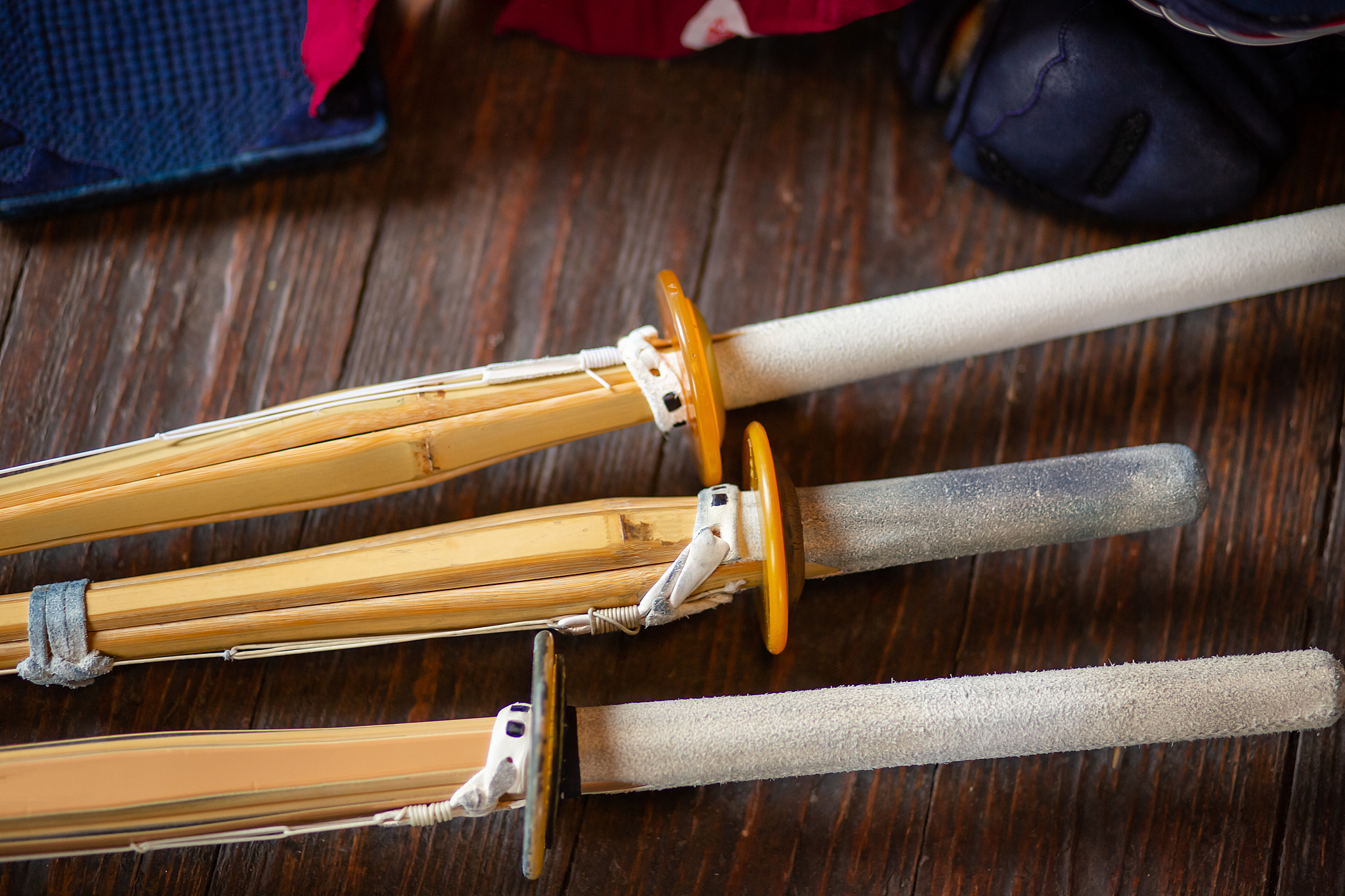bamboo swords close-up. kendo gloves, helmet and bamboo sword on