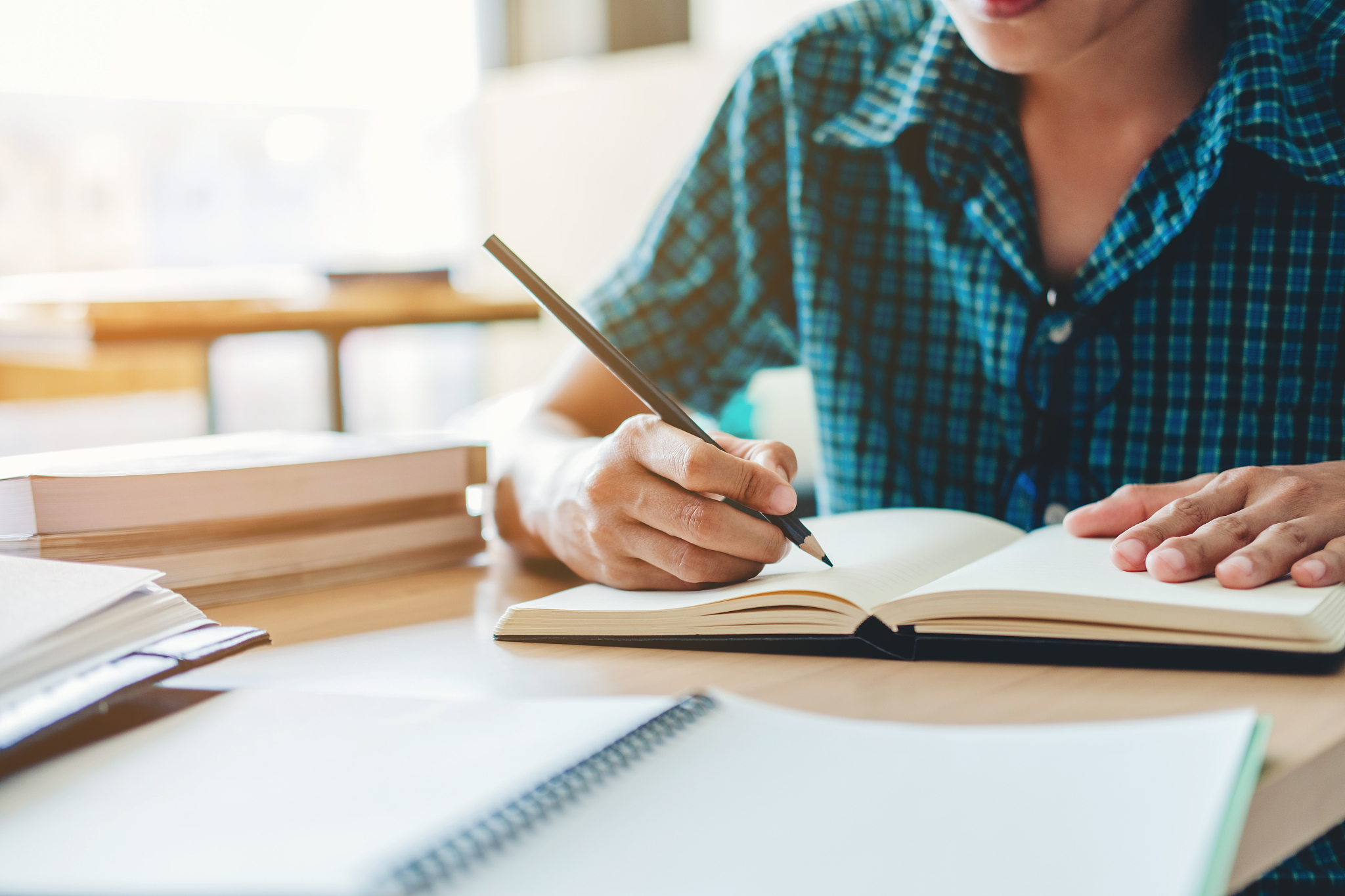 high school or college student studying and reading together in 