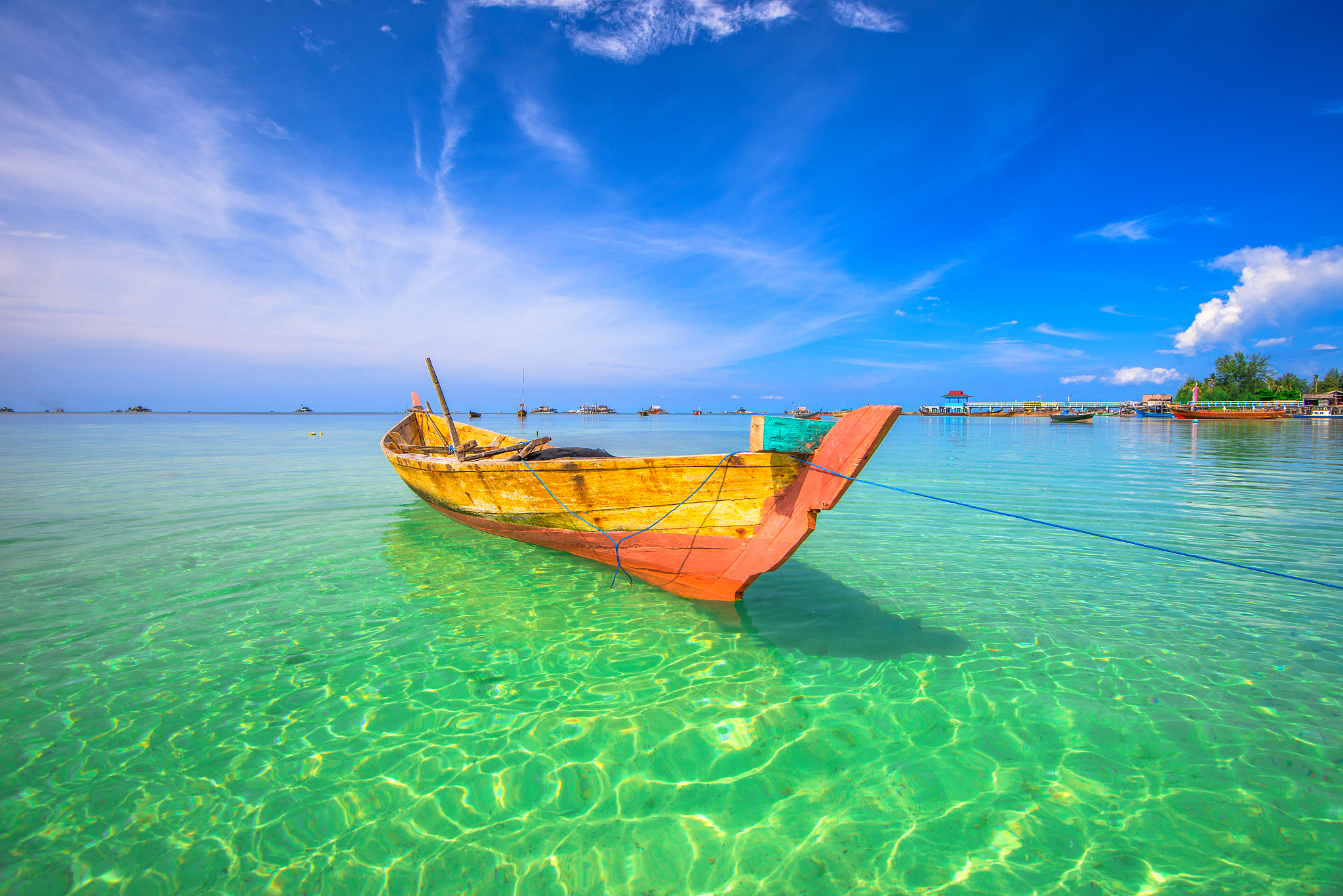 traditional boat with clean sea at bintan island