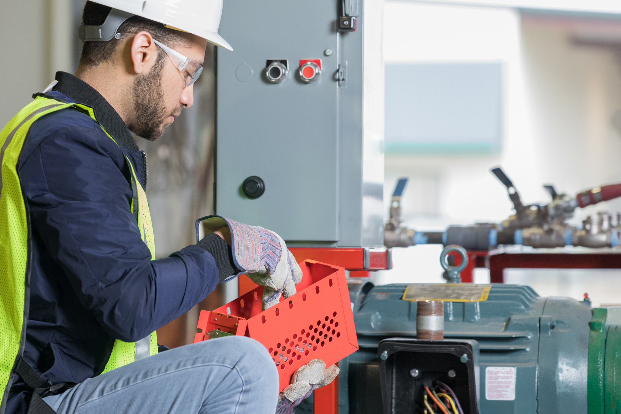 professional working in oil and gas industry using safety proced