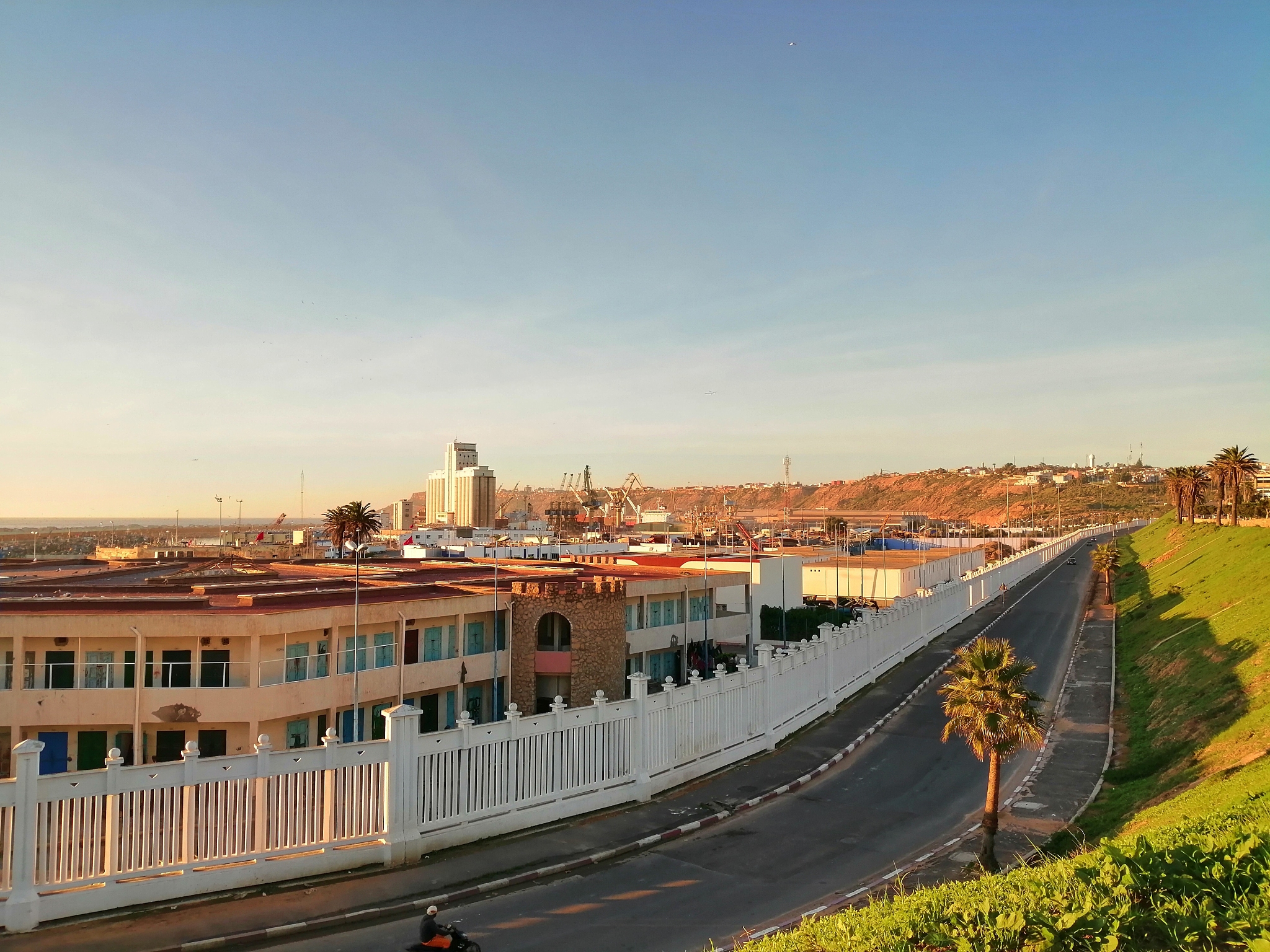 high angle view of road by buildings against sky