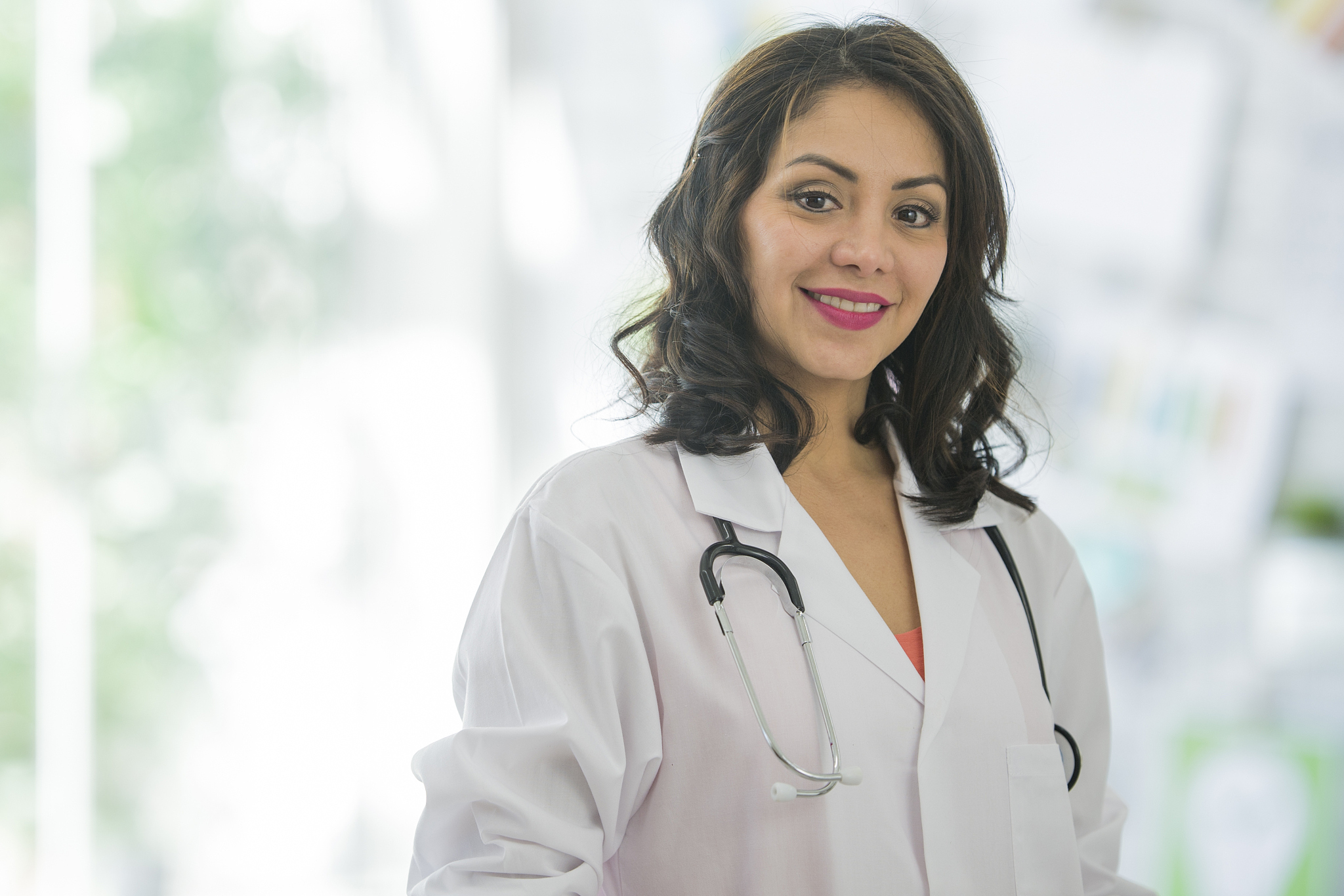 doctor standing by window