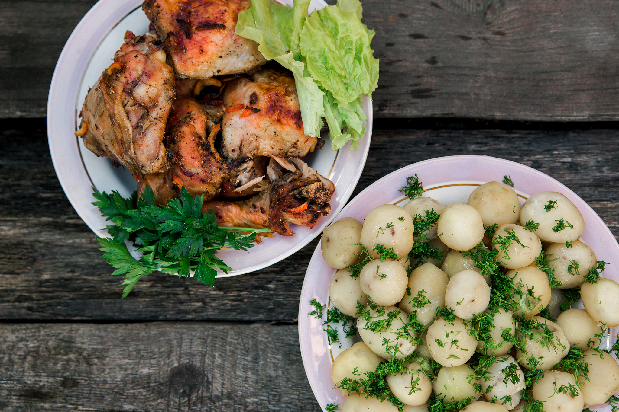 fried chicken and young potatoes with dill.simple rural dish.woo