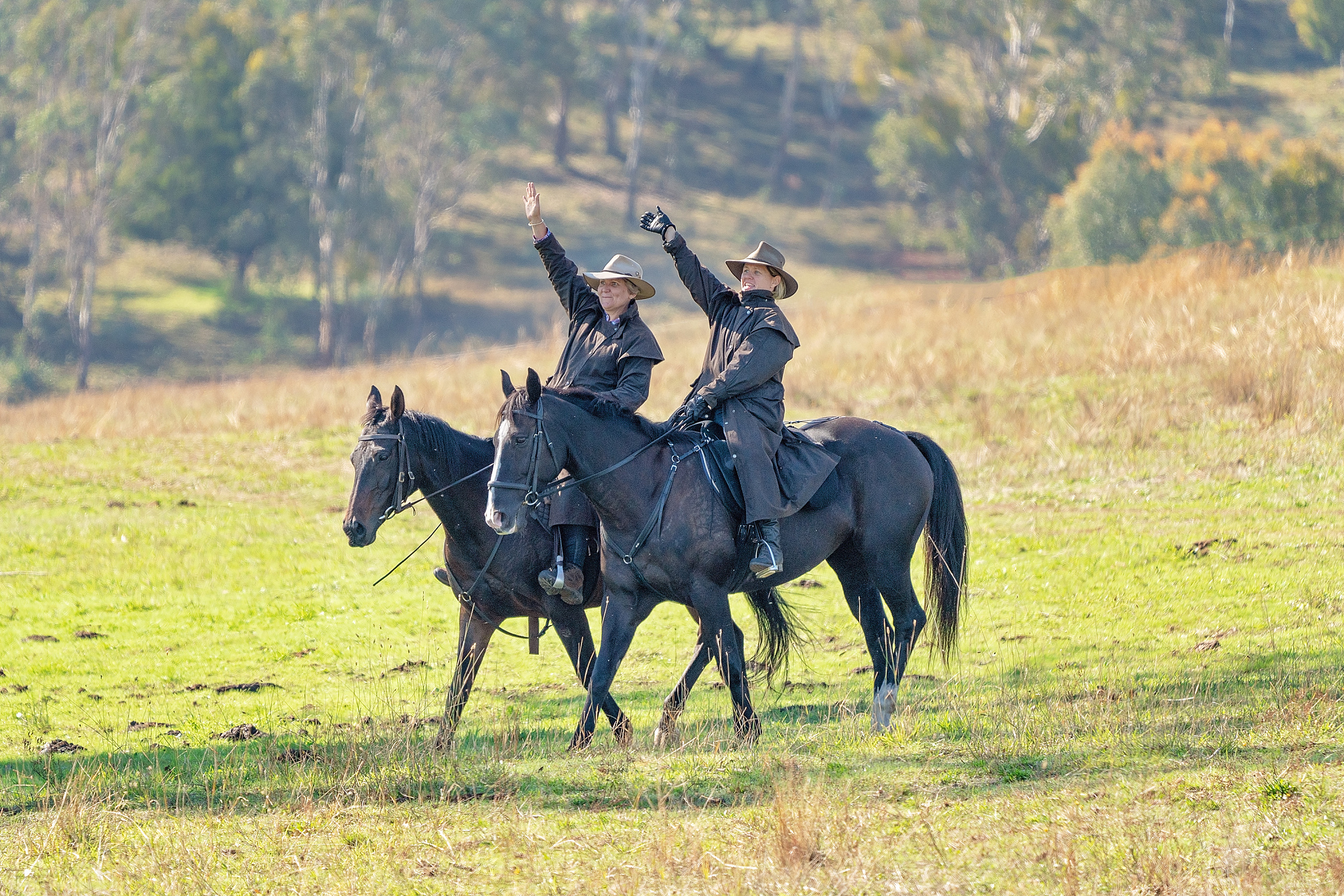 two riders on horseback at bush festival re-enactment