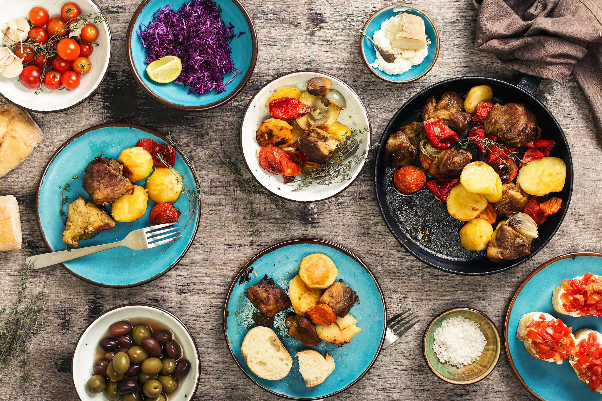 food table, fried meat with vegetables, salad and appetizers