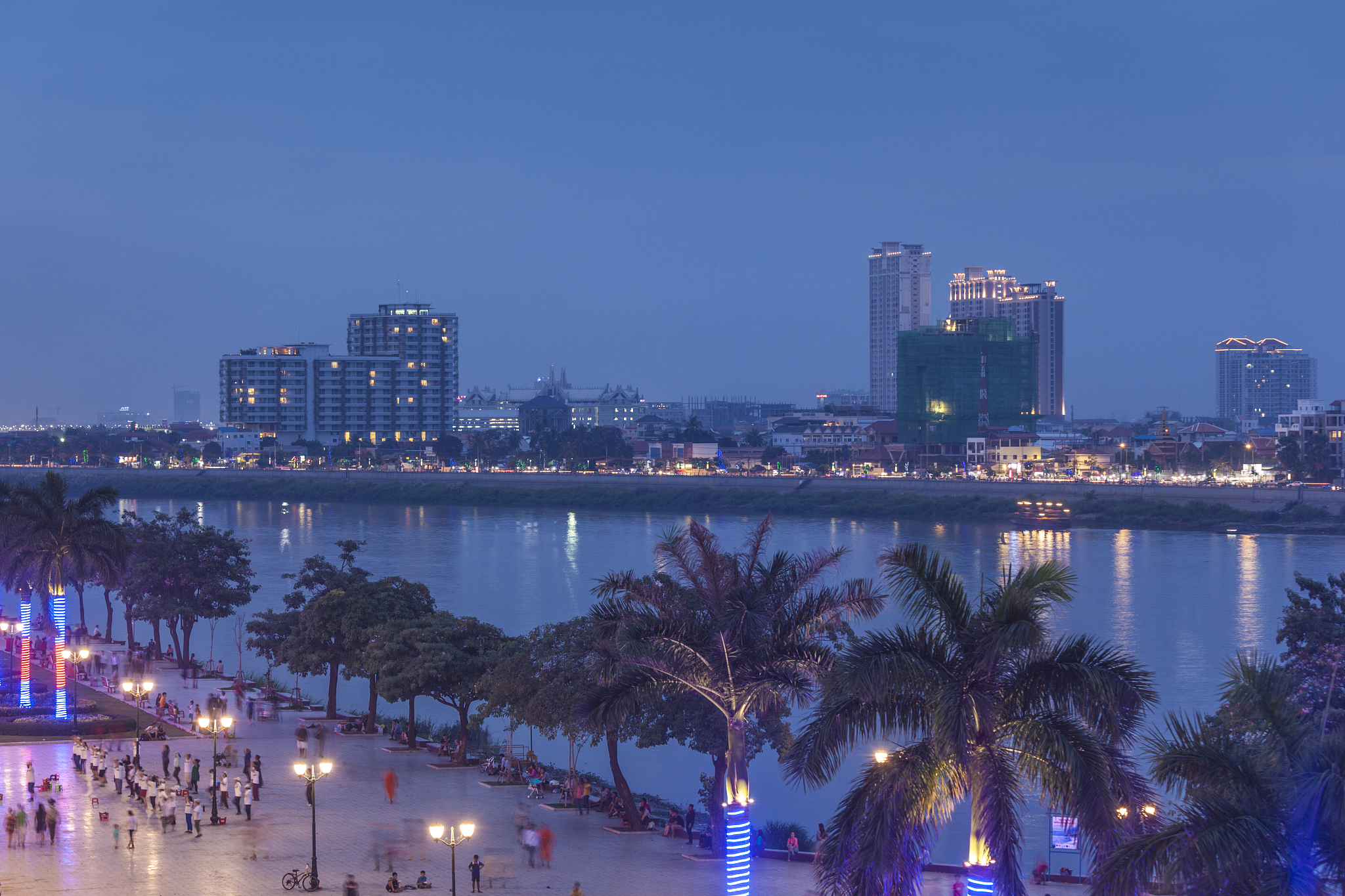 phnom penh, elevated view along tonle sap riverfront, dusk