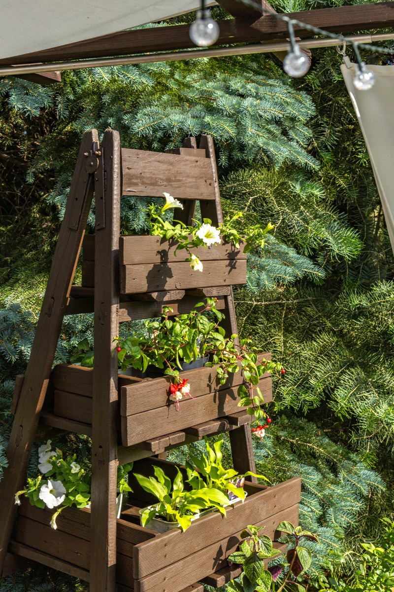 Rustic Wheelbarrow Planter: Decorative Plant Container & Display Shelf