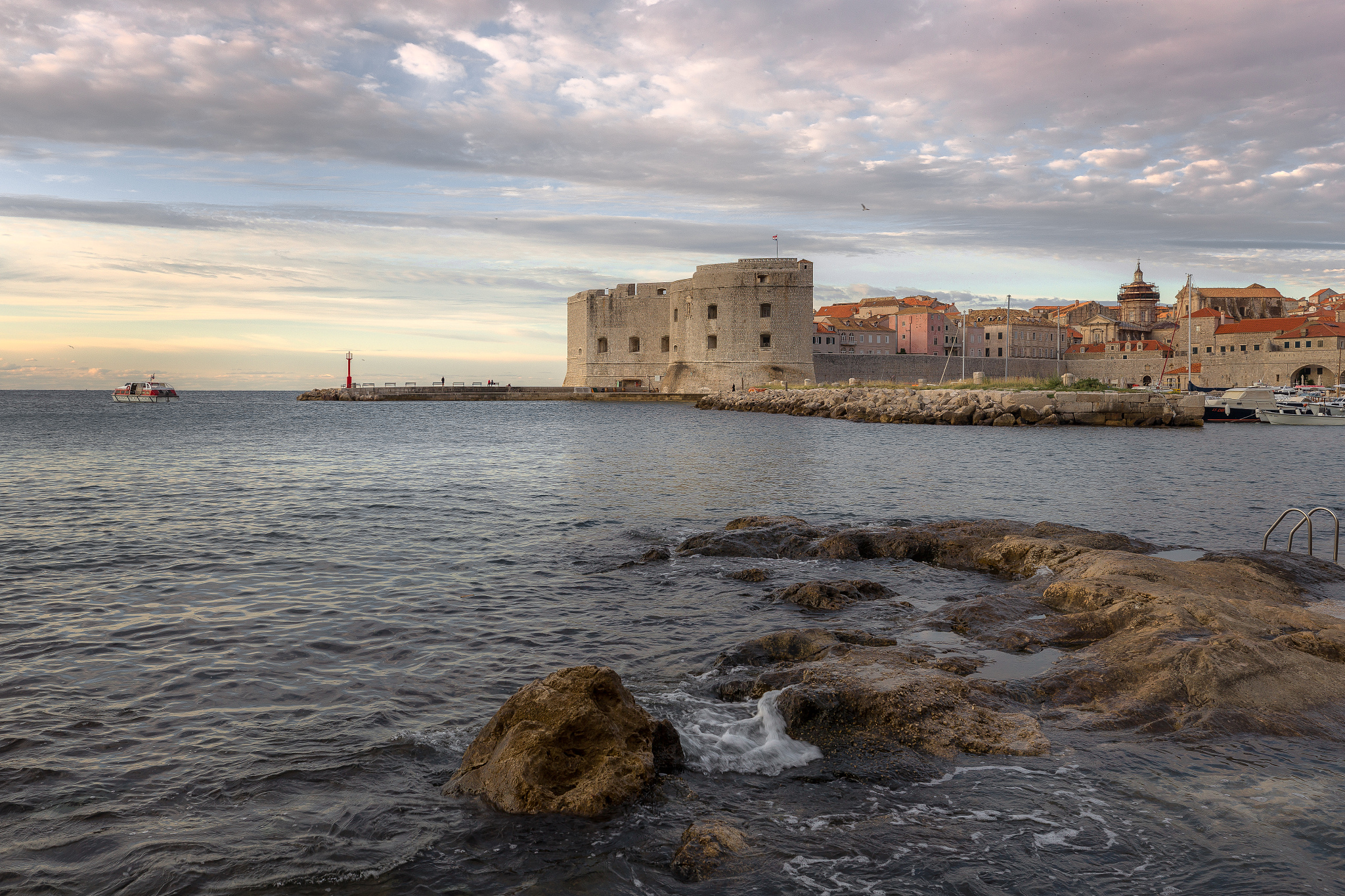 seascape and ancient building of the walls in dubrovnik, croatia