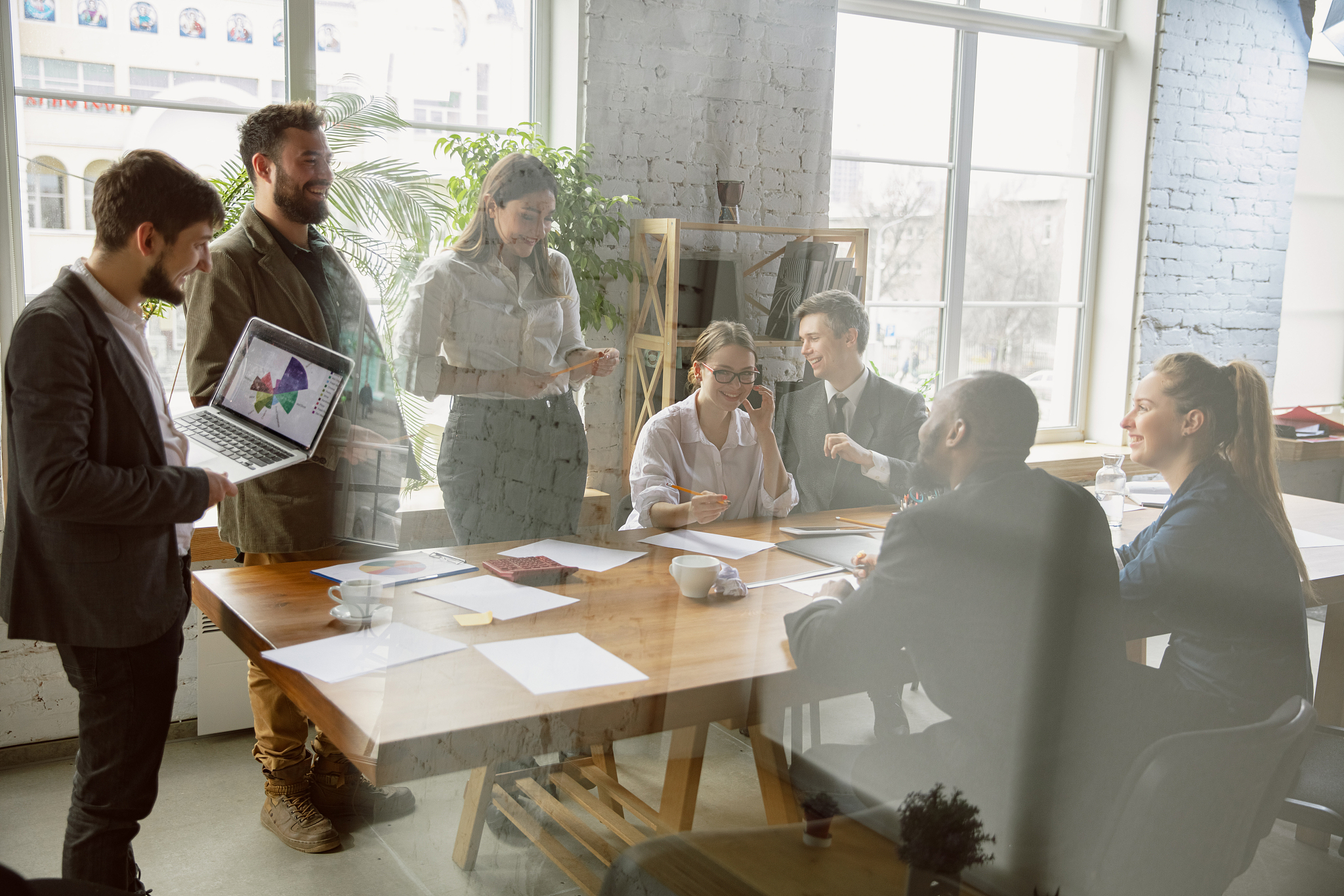 group of young business professionals having a meeting, creative