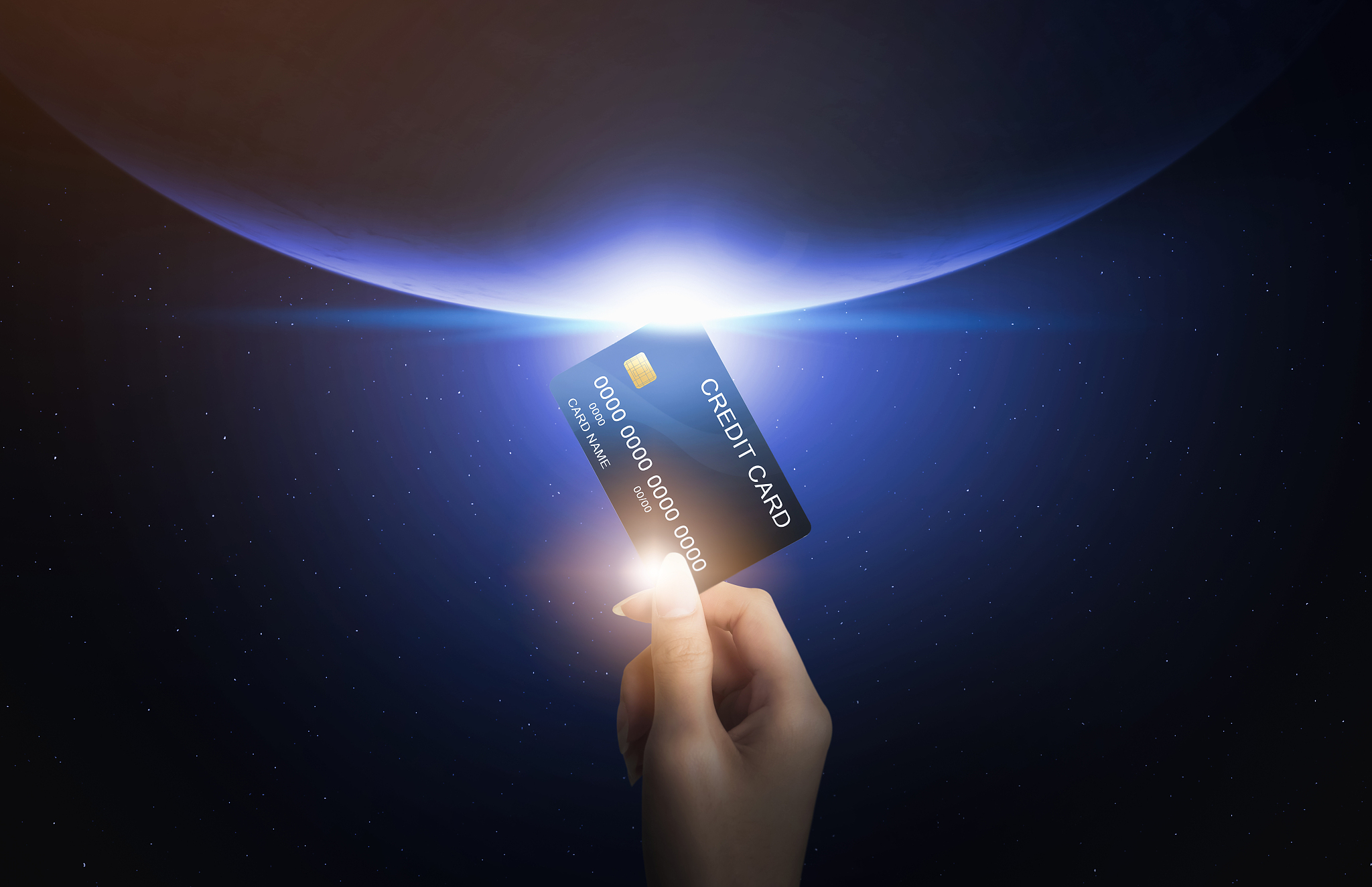 hand holding credit card and abstract worldwide connected around