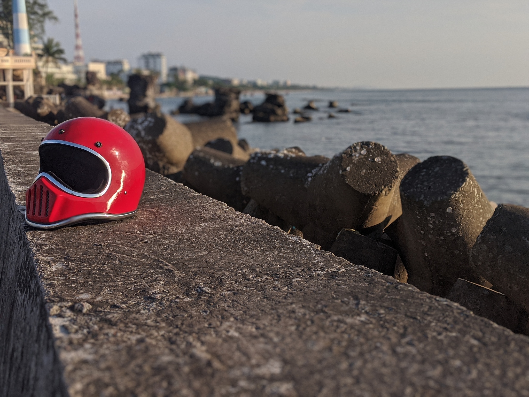 close-up of stones on beach against sky