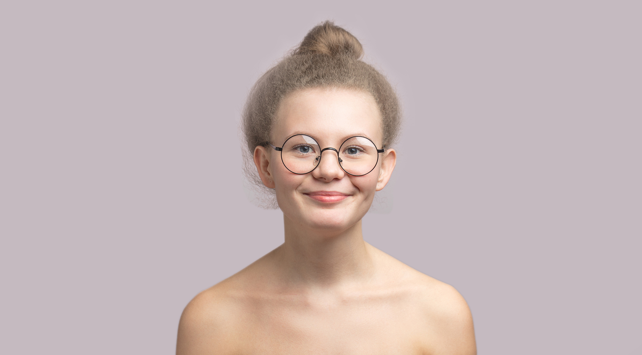 sensual portrait of beautiful woman wearing hairbun
