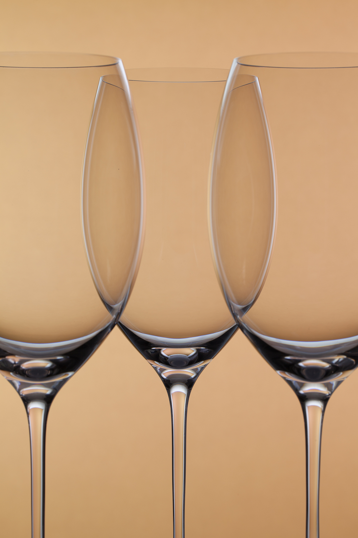 three empty glasses of wine