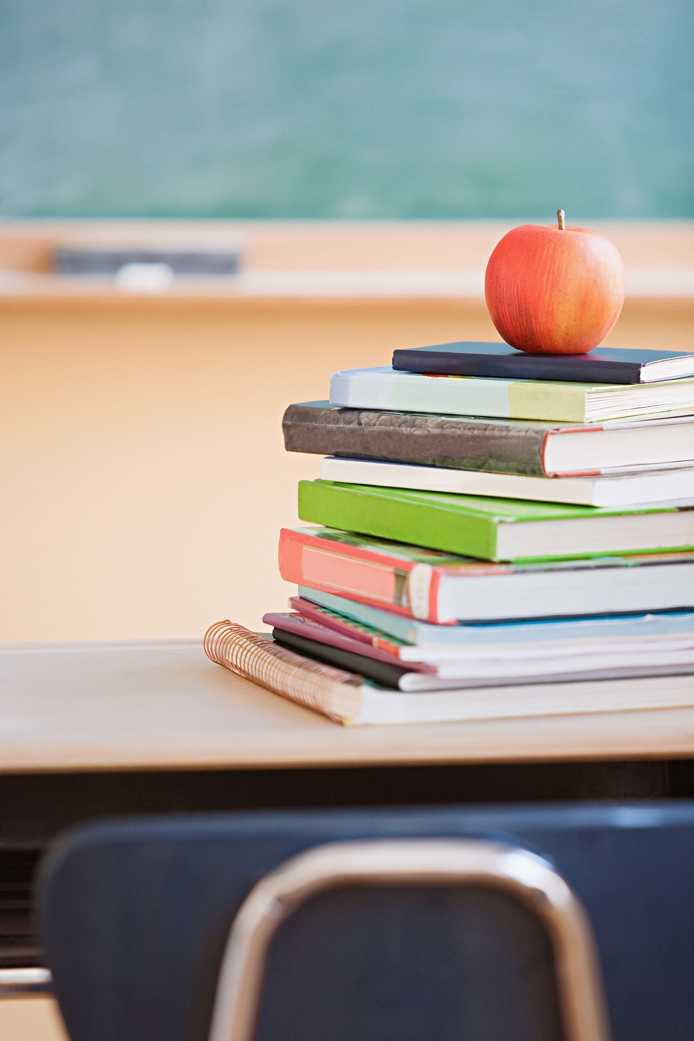 apple on a stack of books