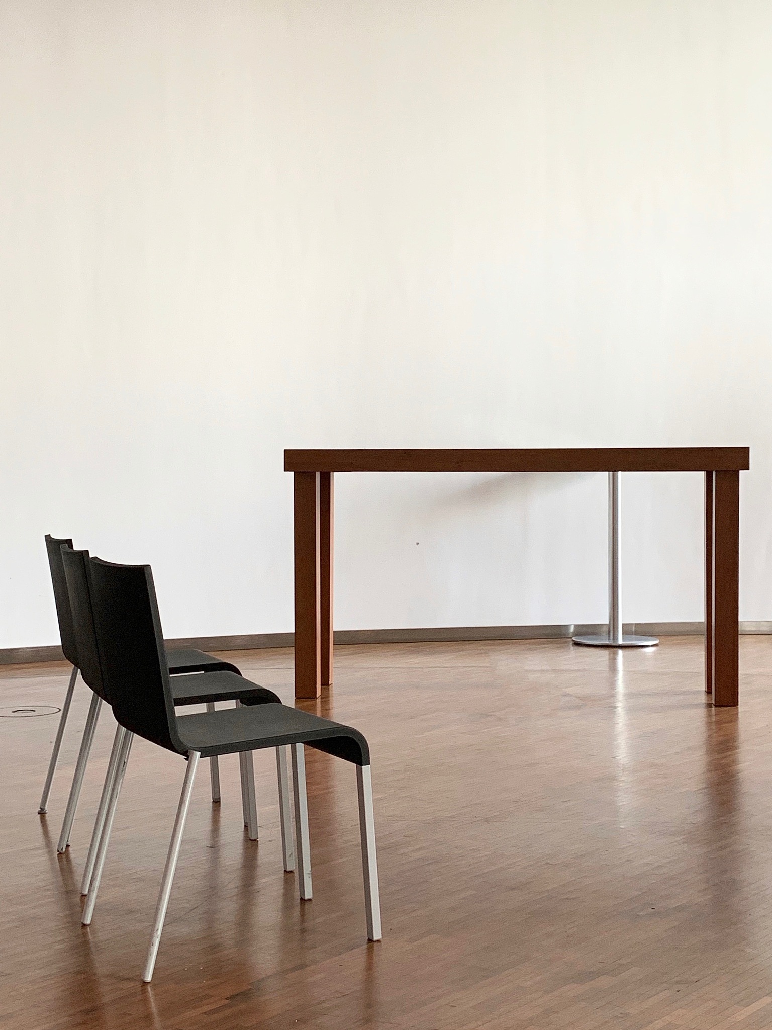 three chairs and a high table in the meeting room