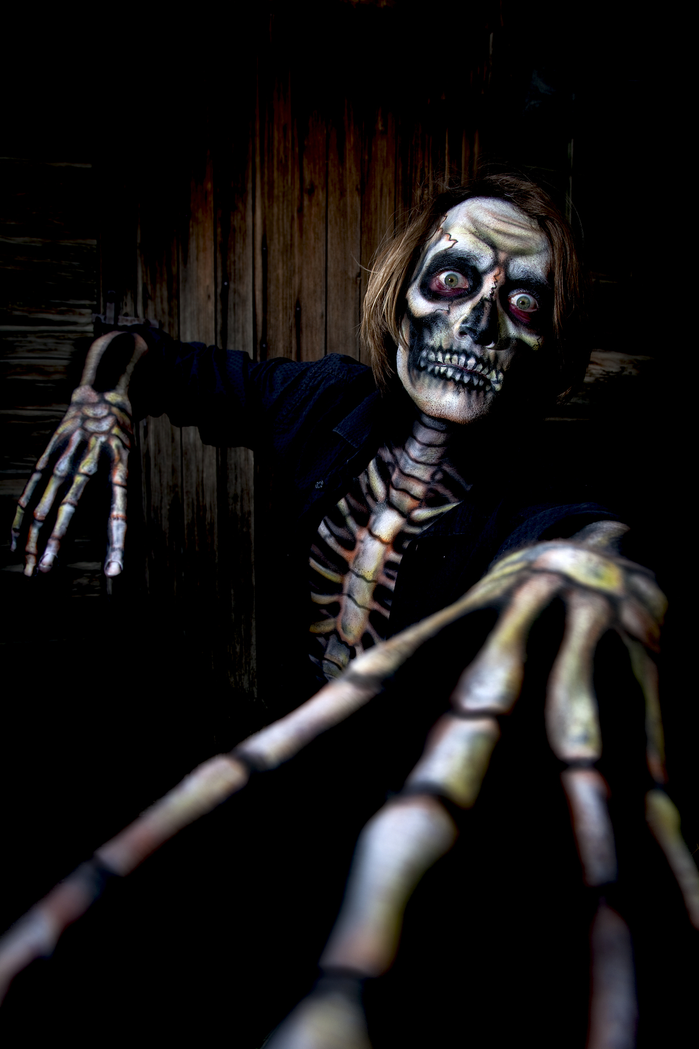 live skeleton in the dark, body paint looks real.
