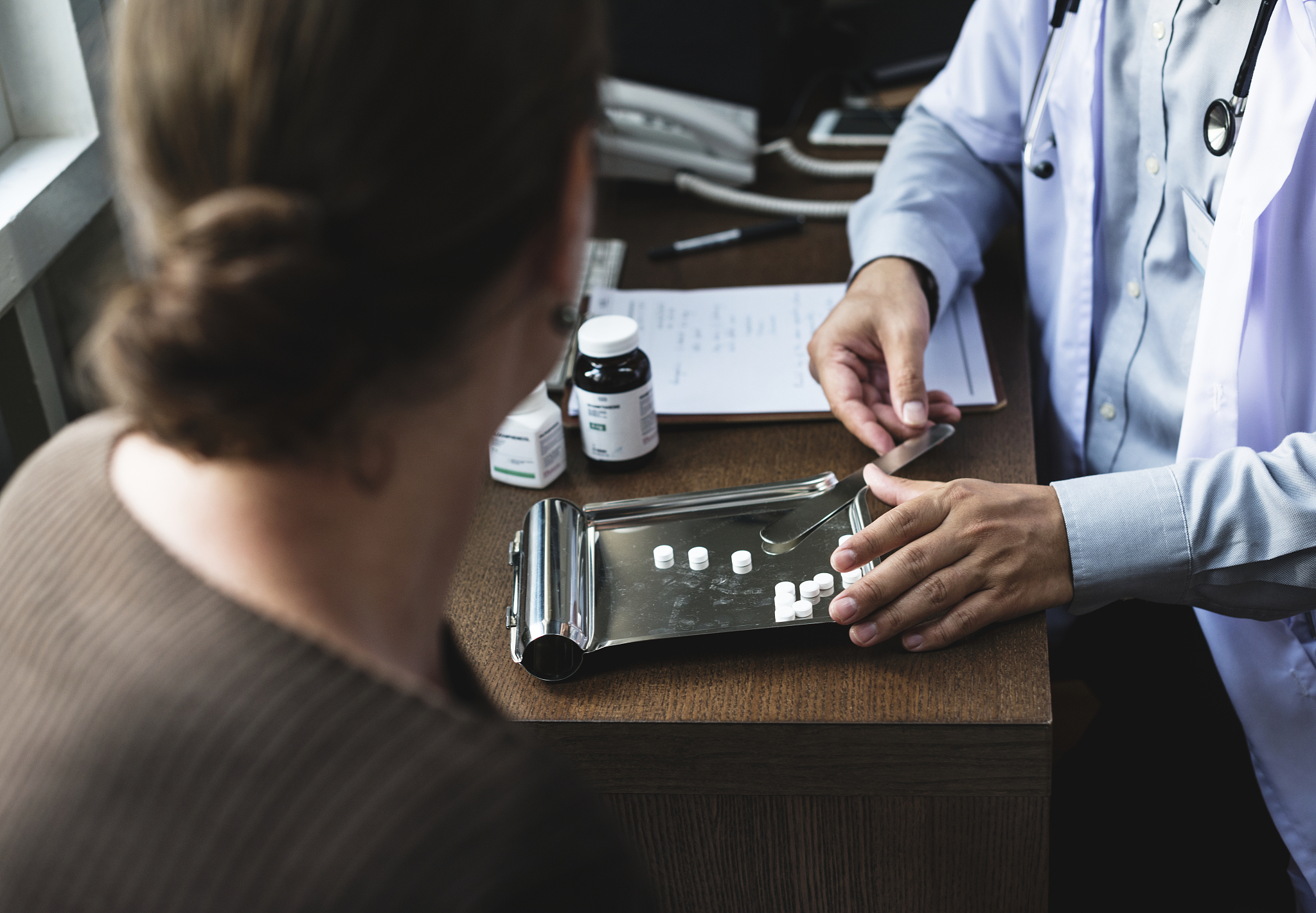 doctor dividing medicine