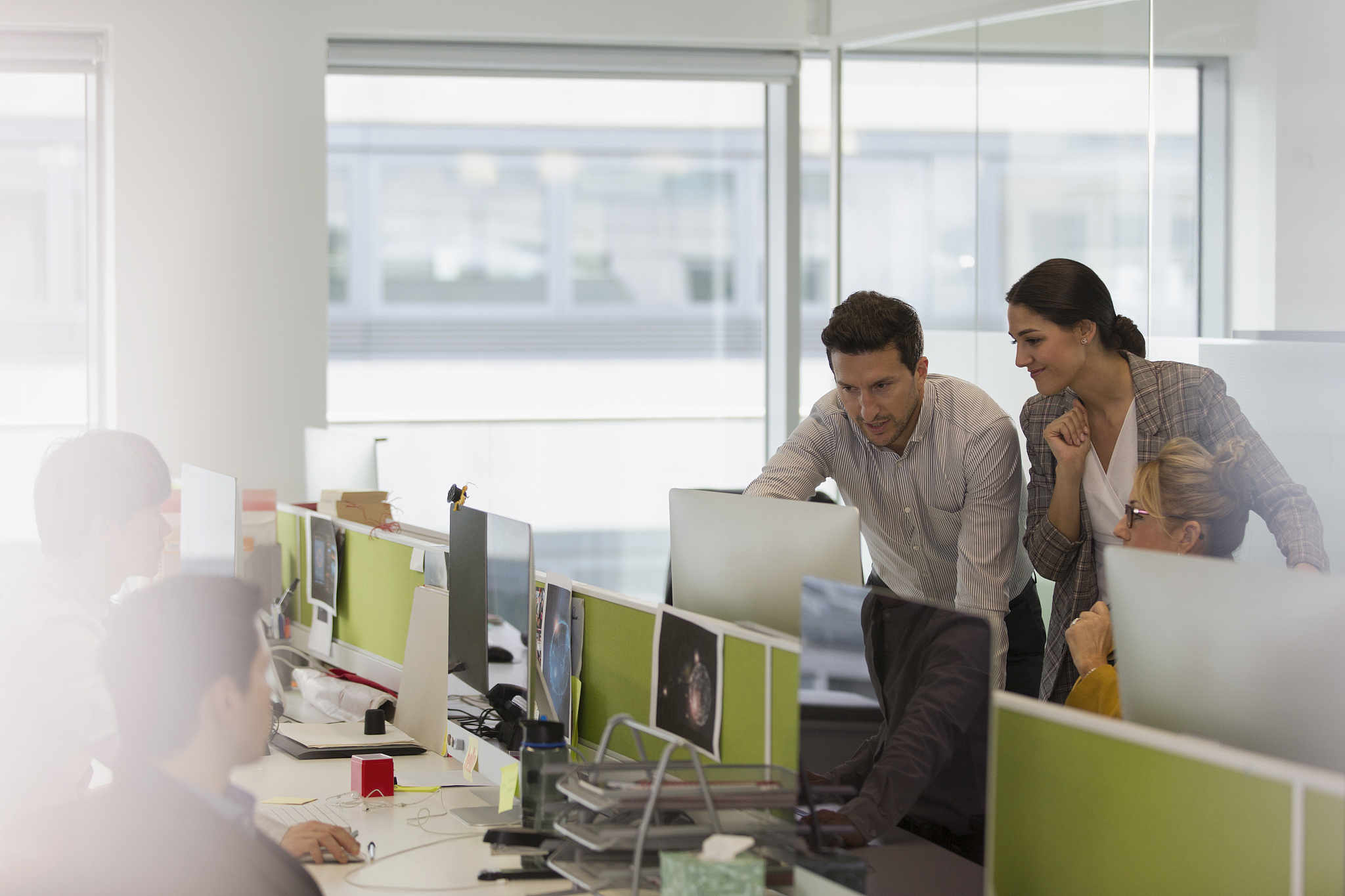 business people talking, meeting at computer in office