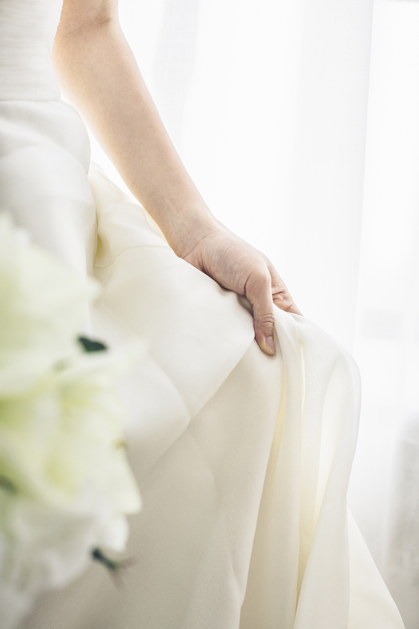 cropped shot of woman in wedding dress