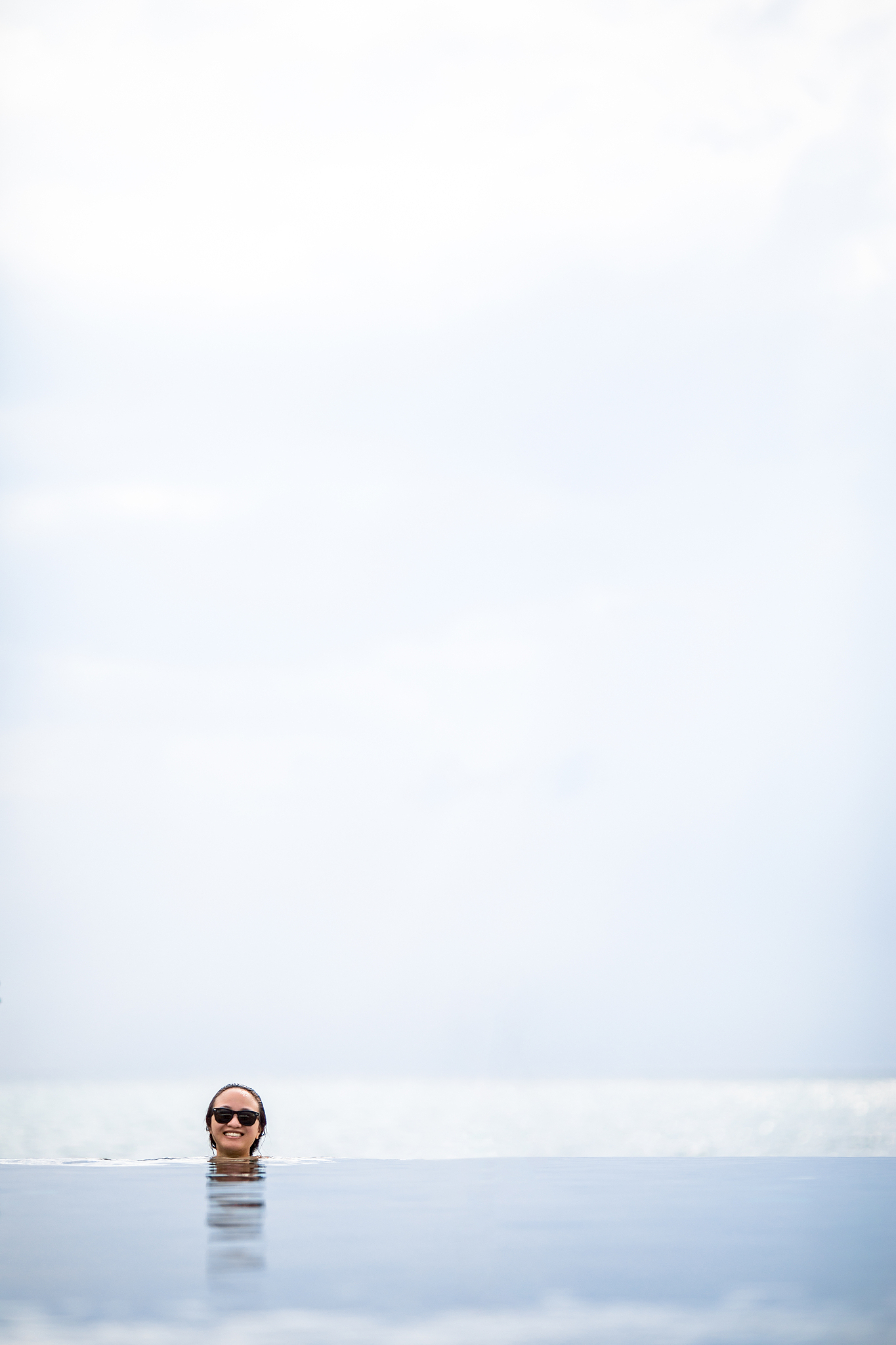 woman swimming on the infinity pool