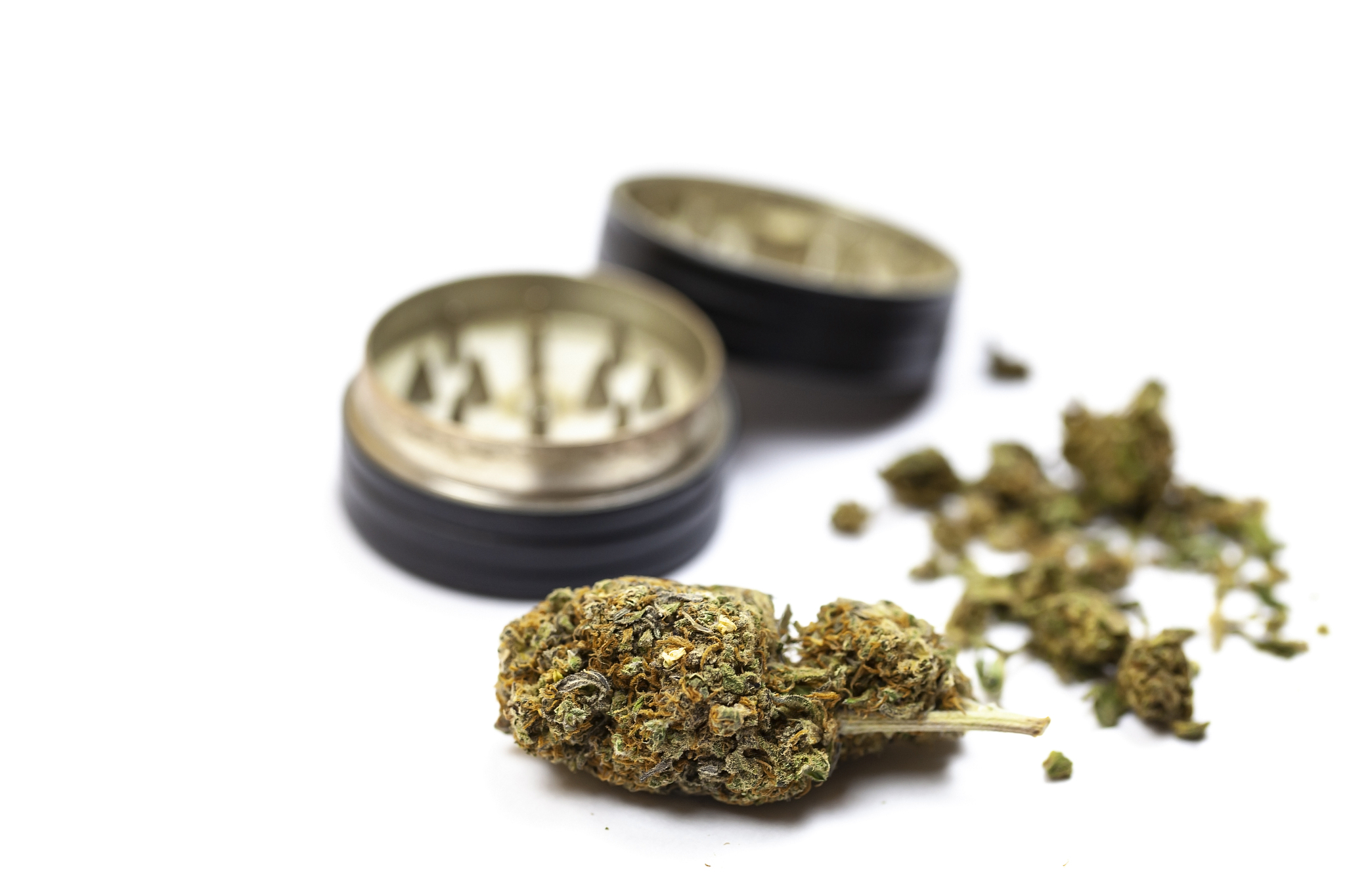marijuana with mill on a white background