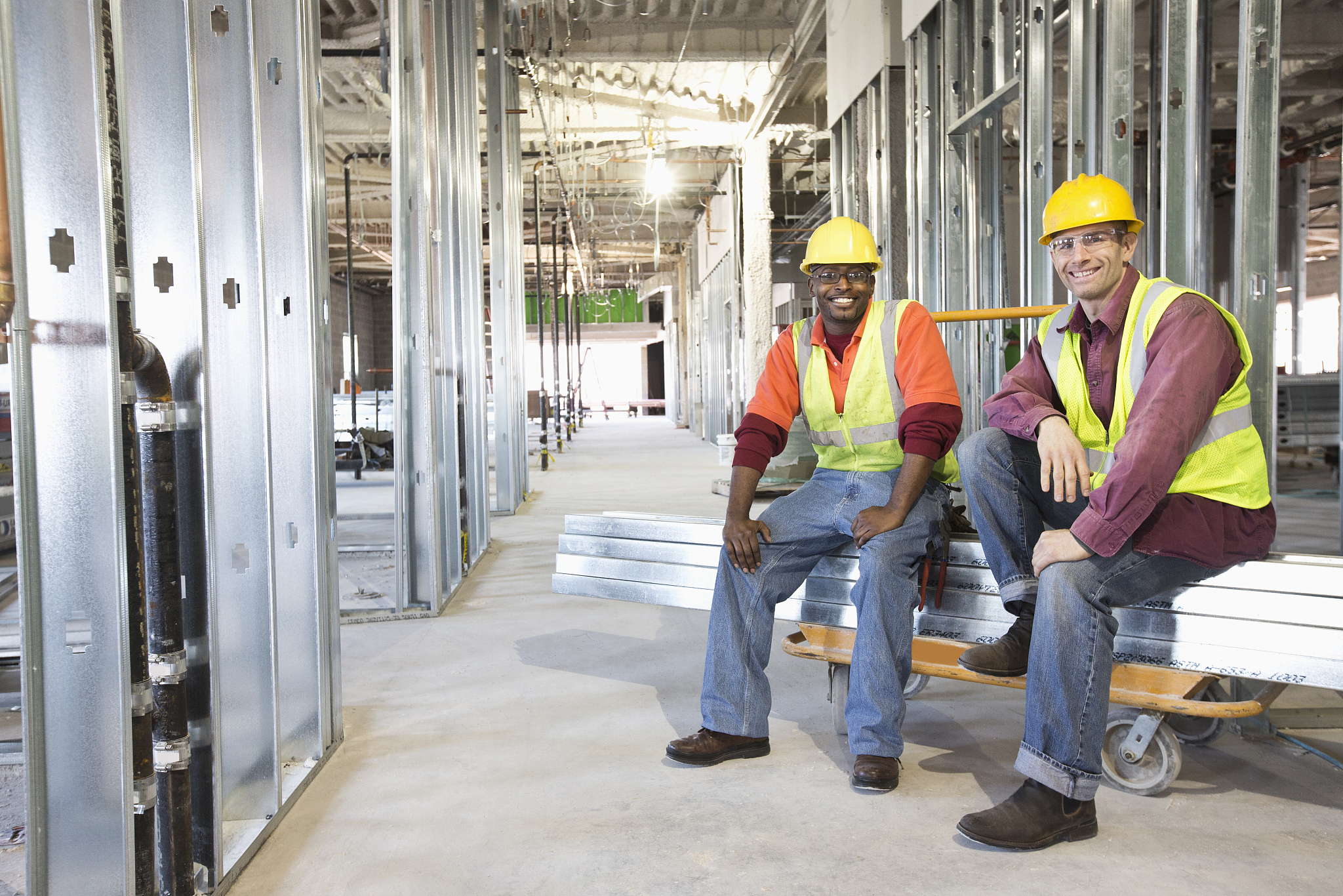 construction workers smiling at construction site