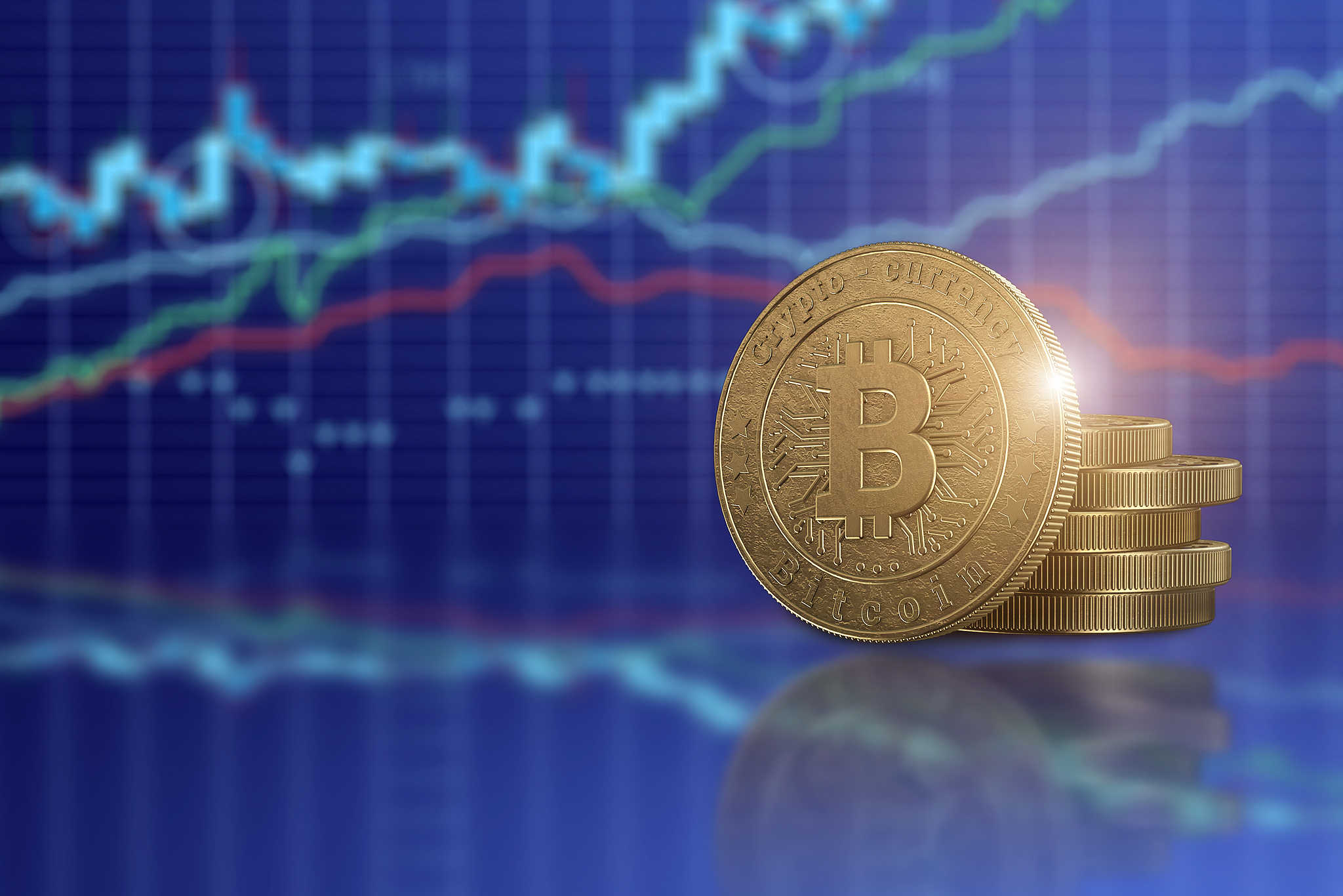 gold coin bitcoin on a background of business charts, blue backg