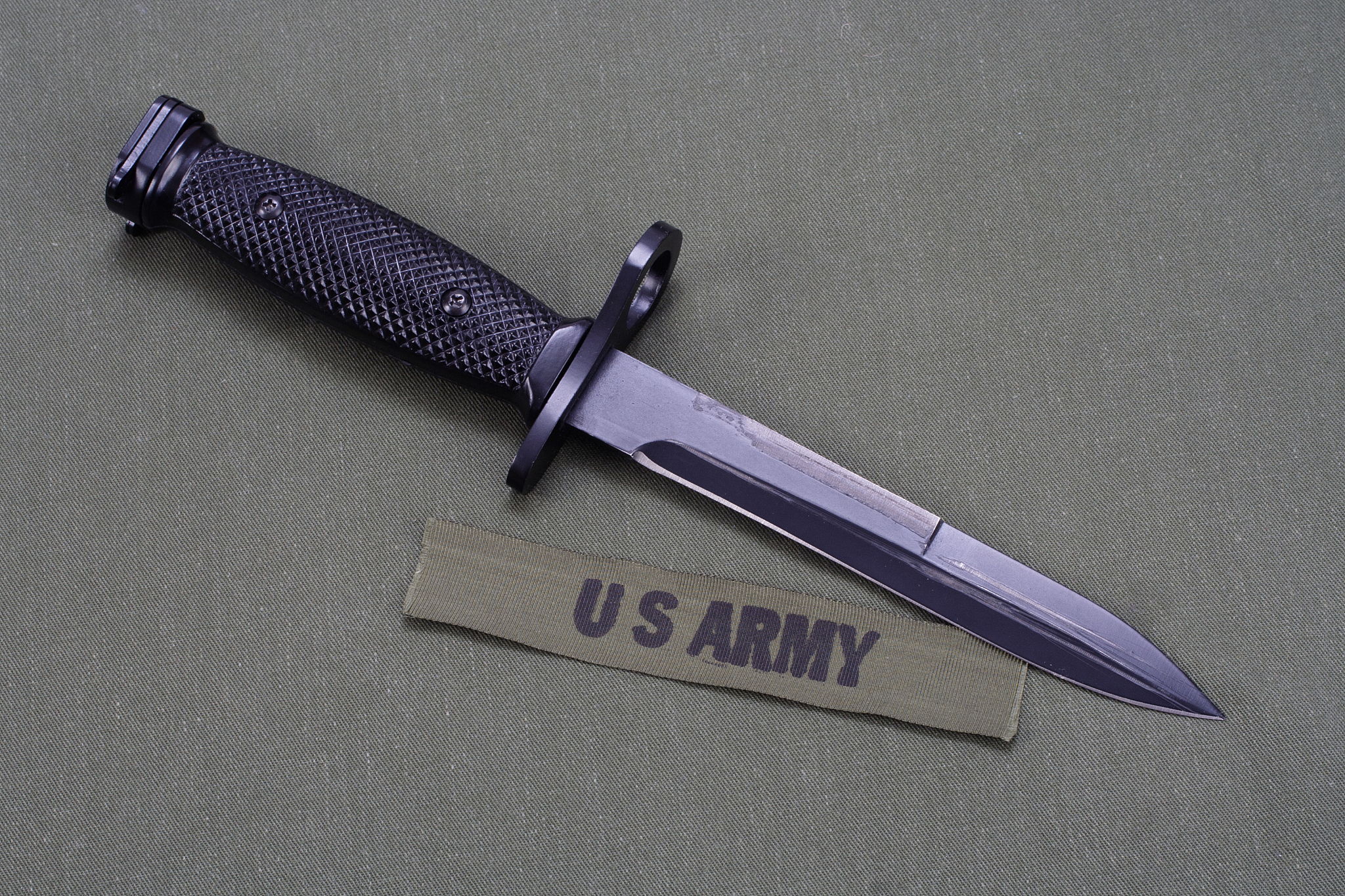 bayonet on us army uniform background