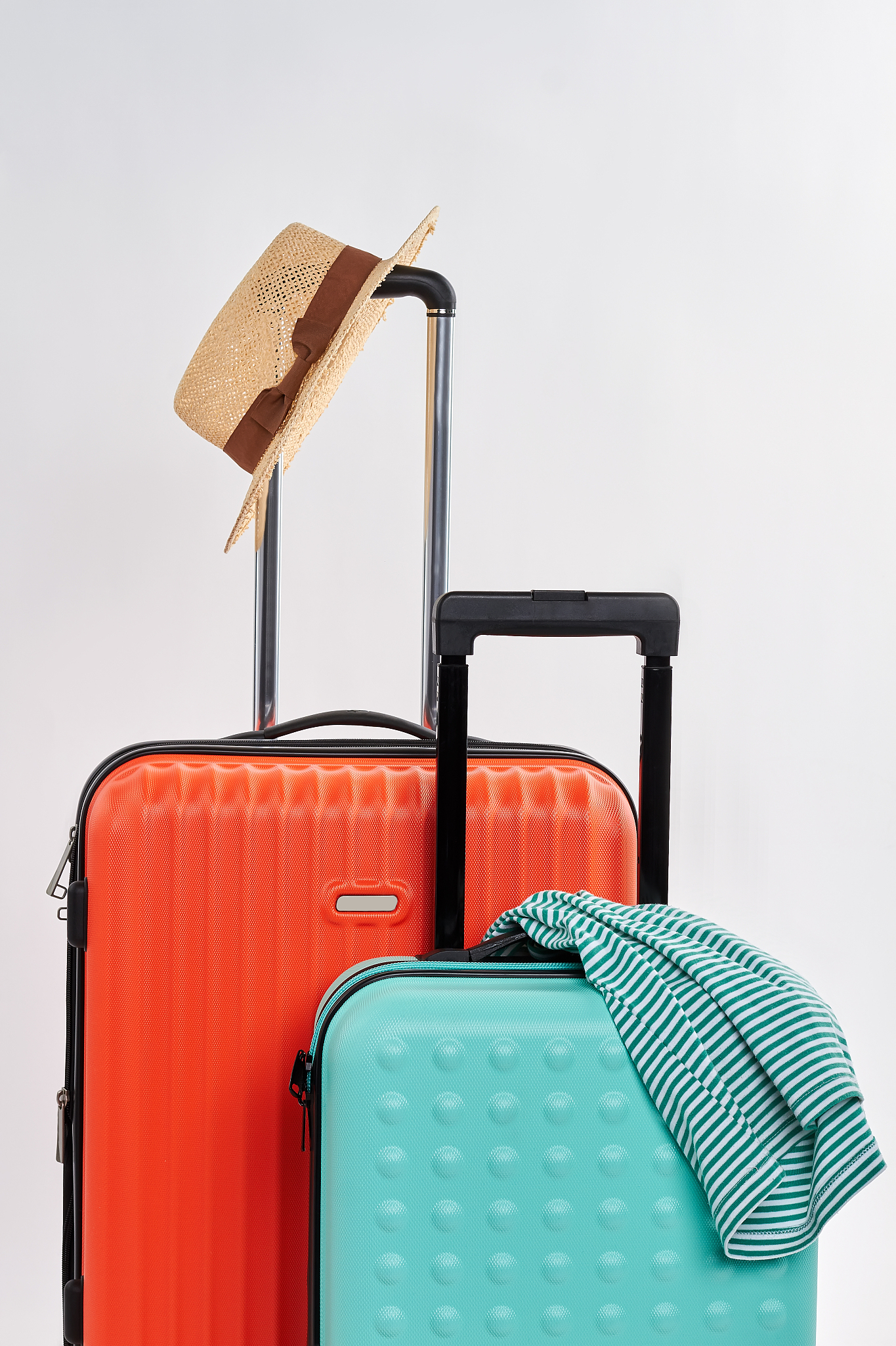 suitcases and clothes for journey.