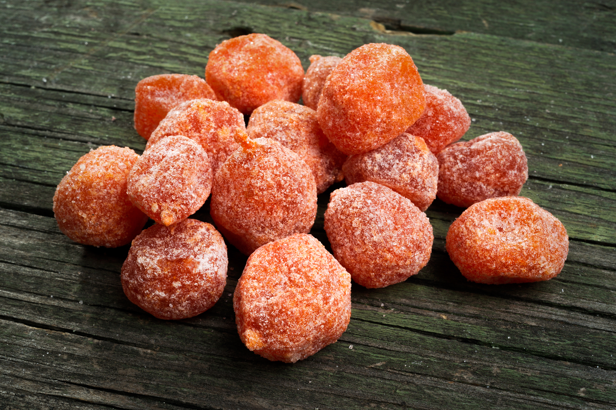dried fruits, kumquat on wooden background