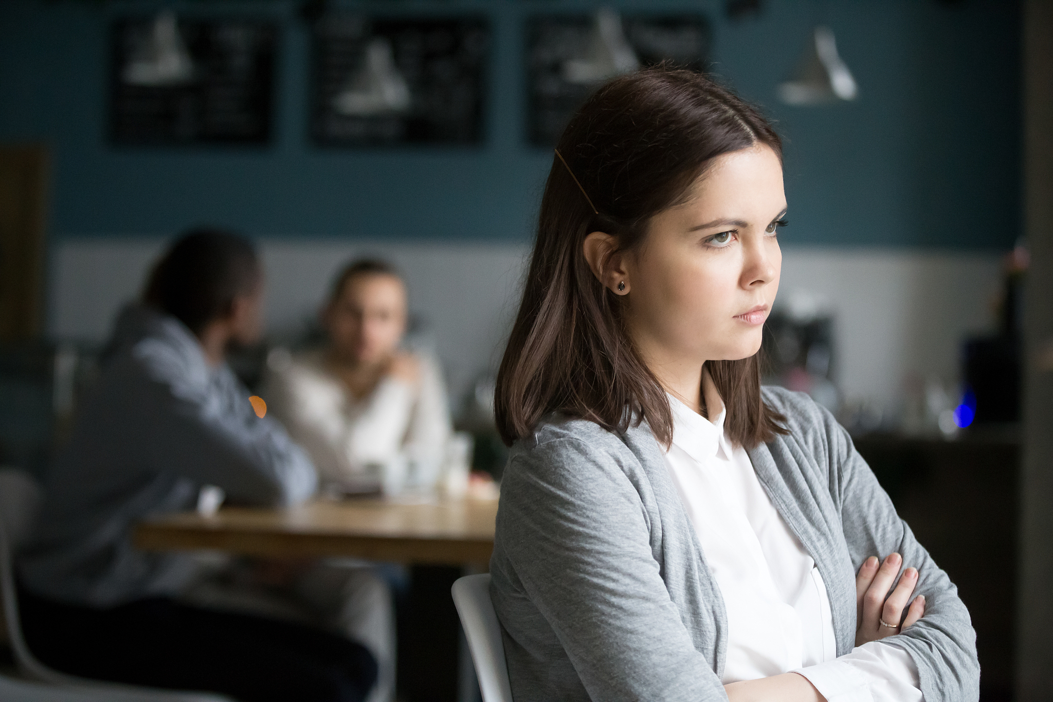 frustrated millennial woman having no friends sitting alone in c