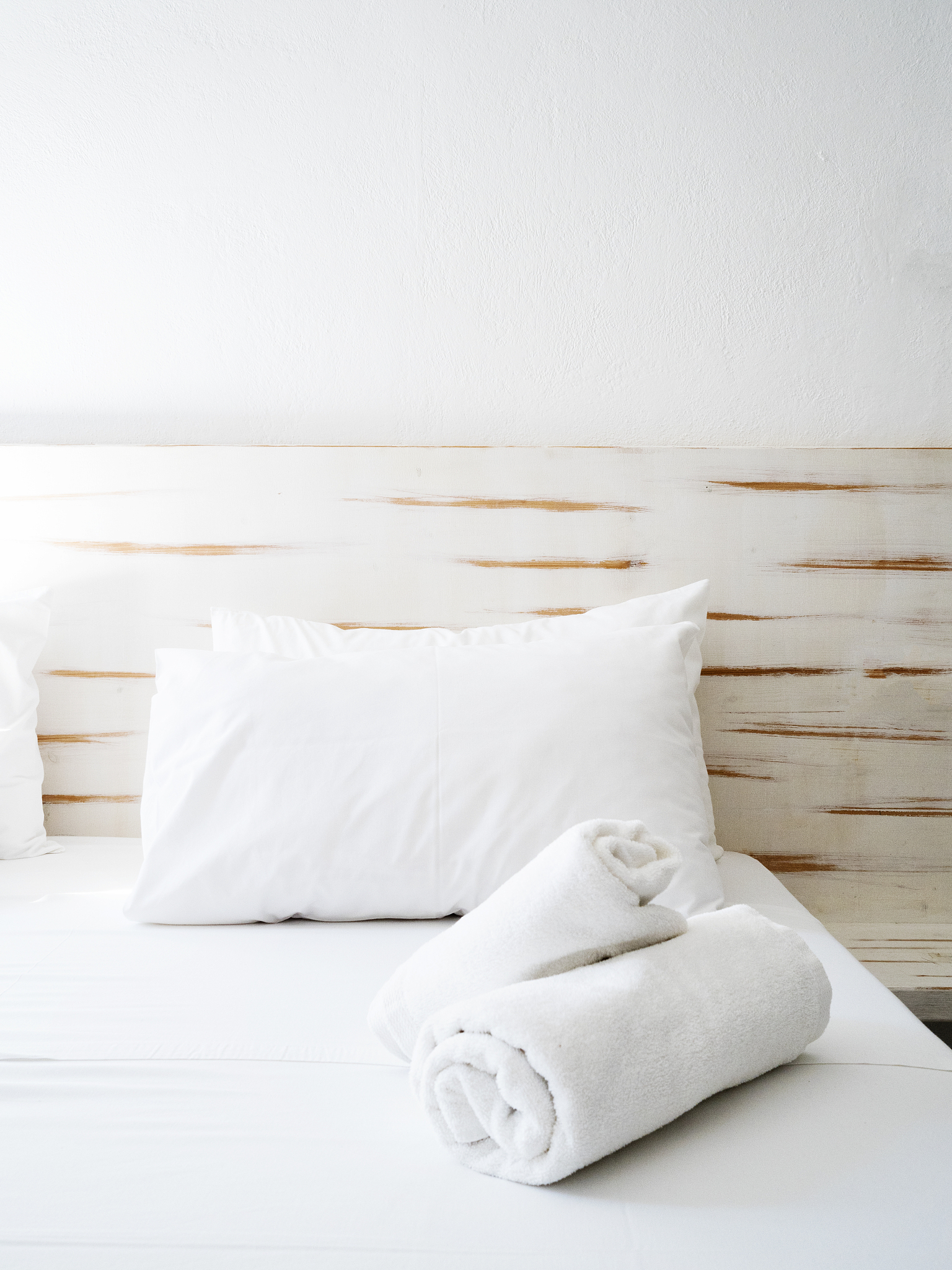 clean towels on bed at hotel room
