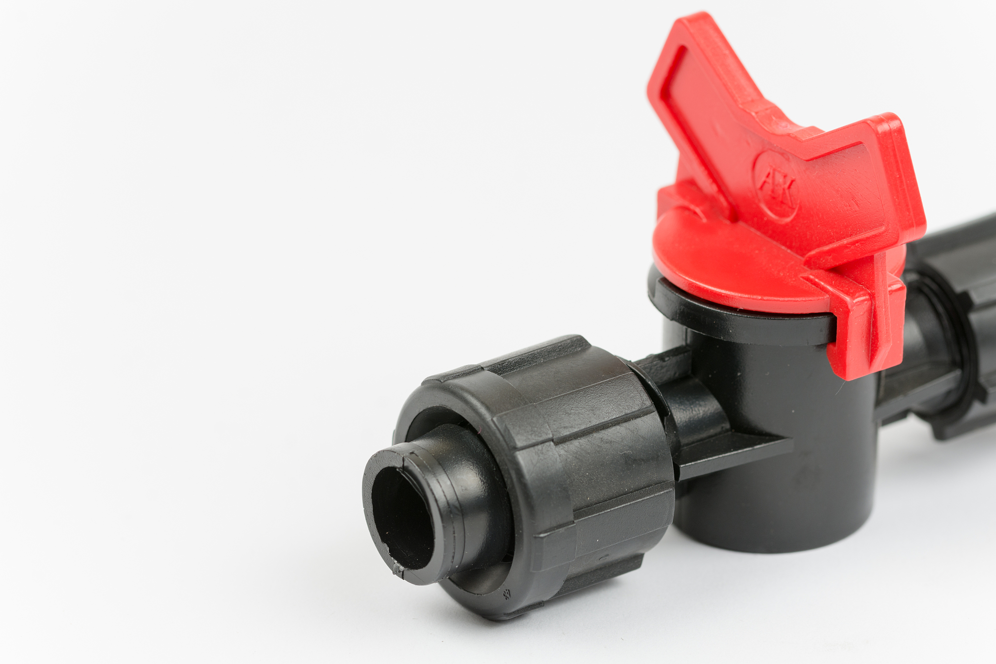 macro shot of irrigation valves over white background