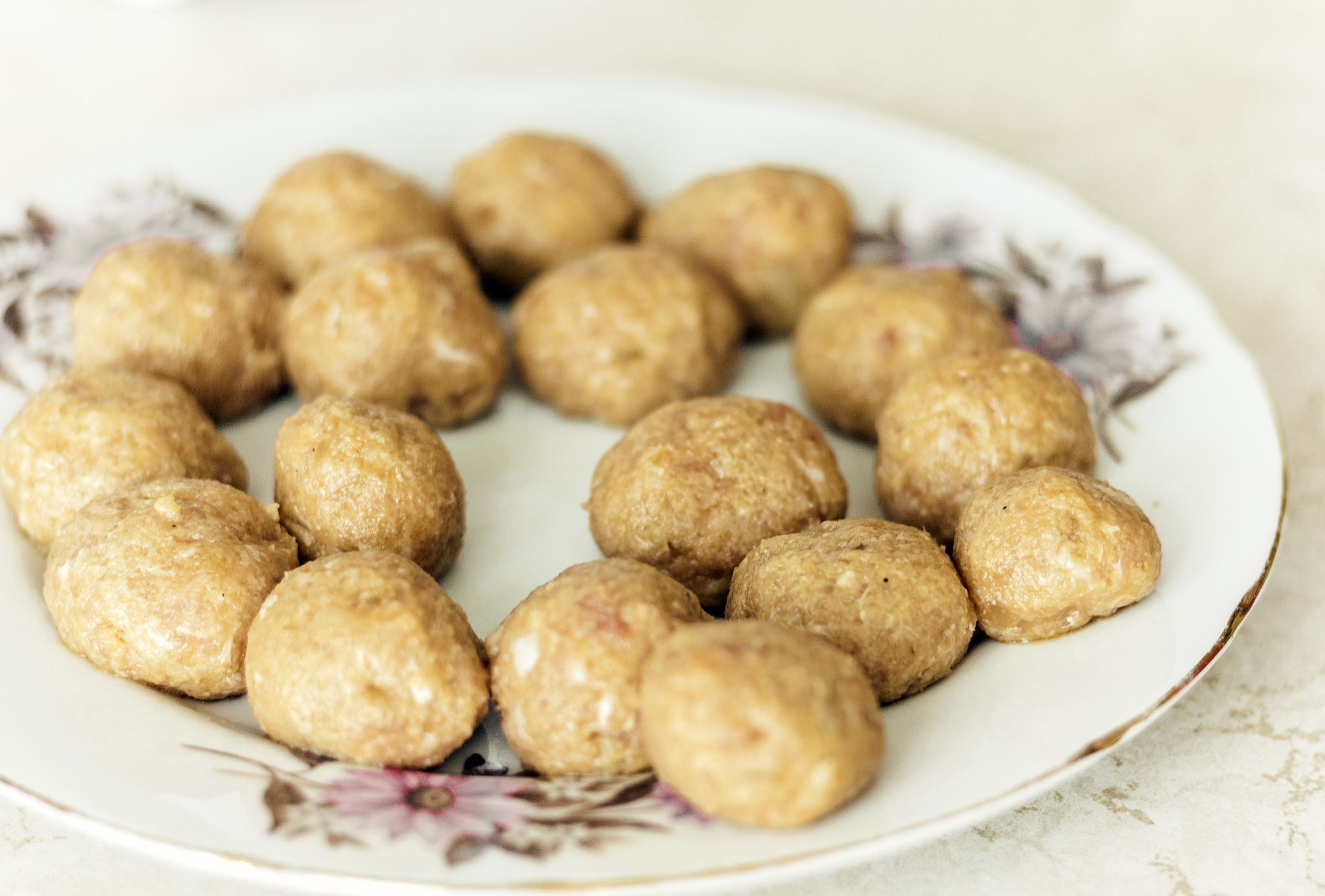 preparing, cooking, making meatballs for homemade fried minced m