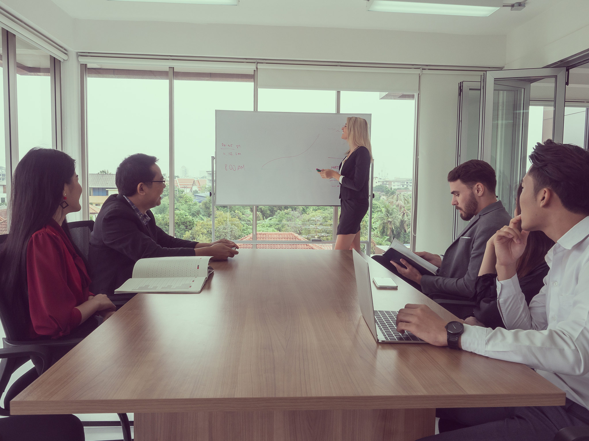 business people in board room,businessman explaining new busines