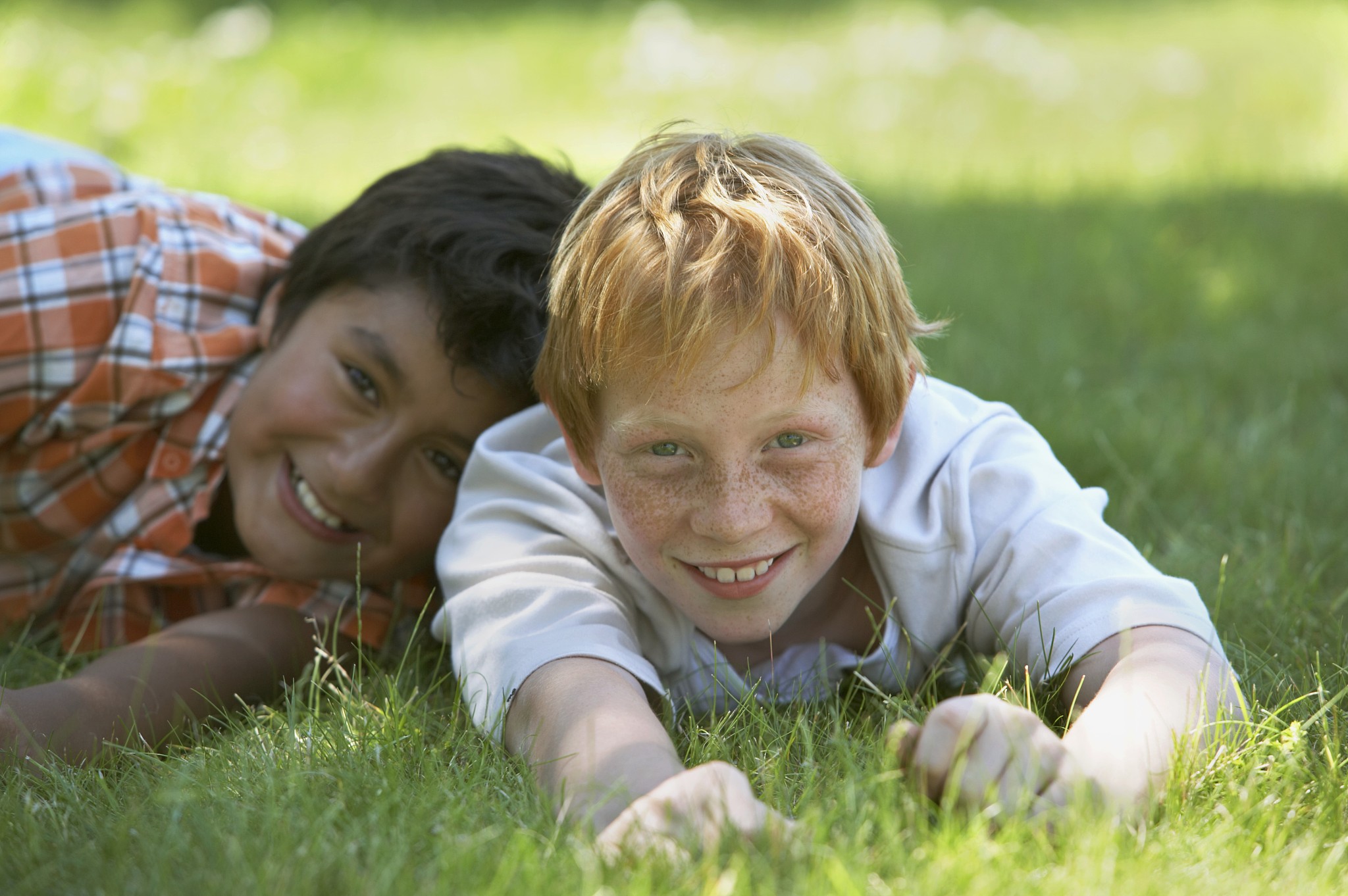boys playing in grass